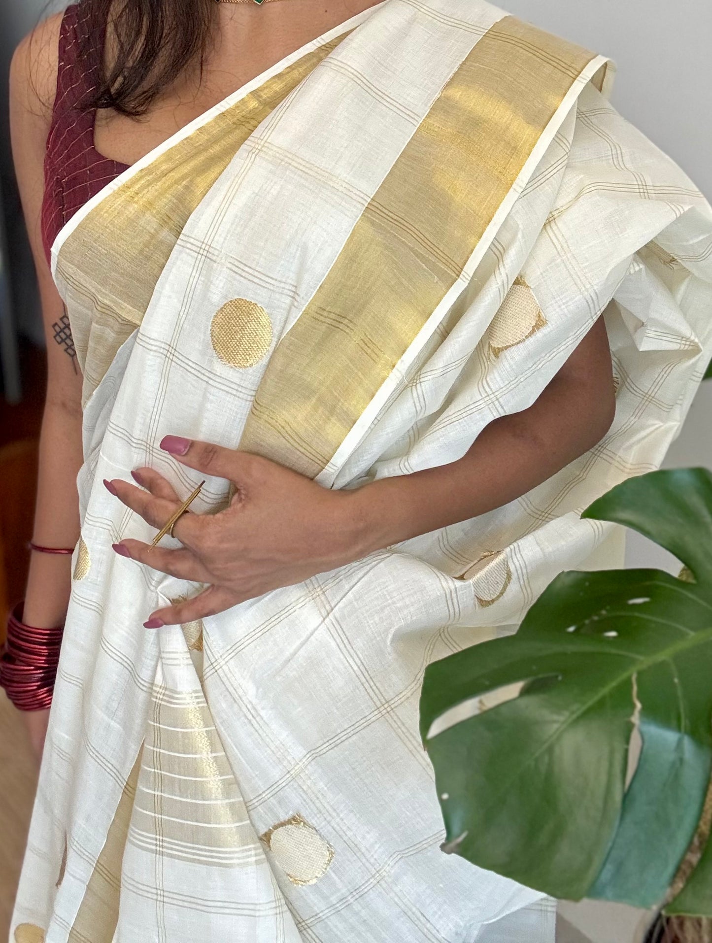 Ivory and gold kerala saree with gold buttas and checks - YCIEON41