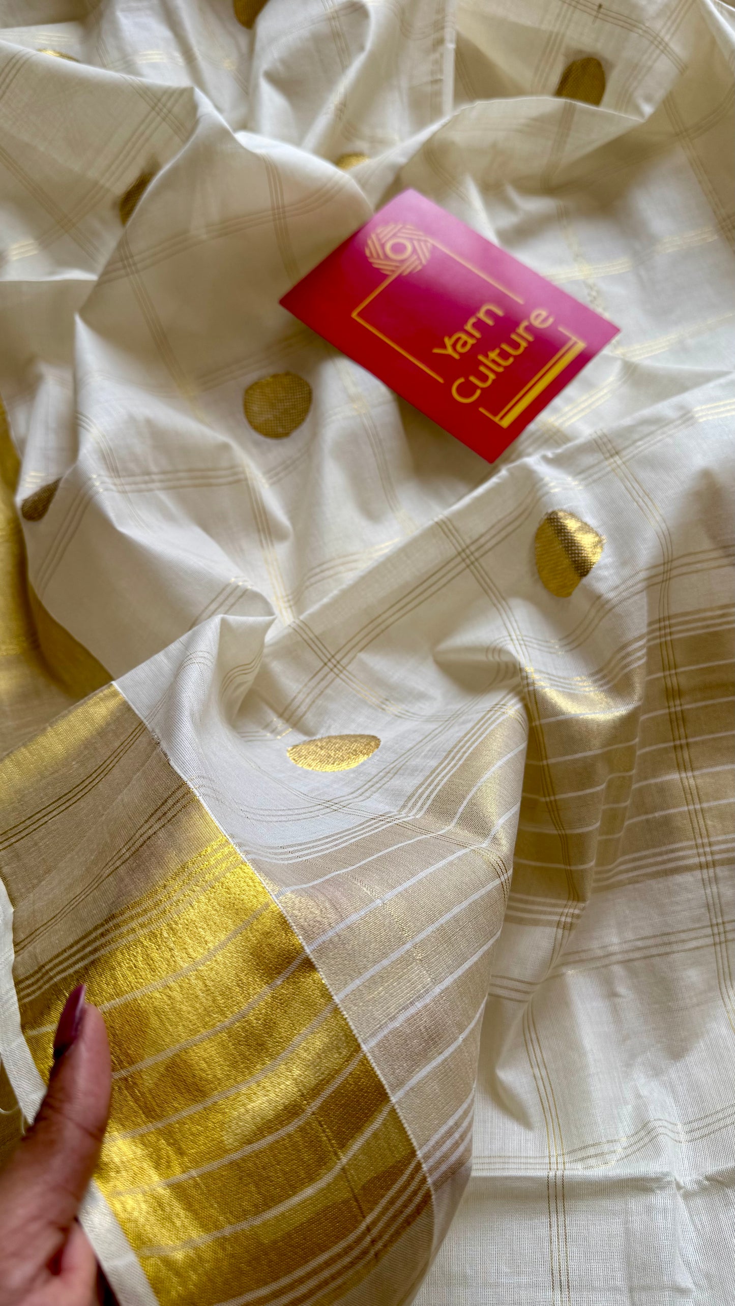 Ivory and gold kerala saree with gold buttas and checks - YCIEON41