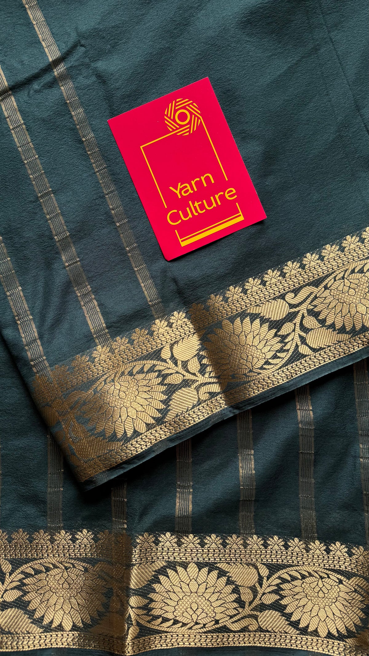 Dark green, semi crepe silk saree with antique gold floral border - YCLOKOC57