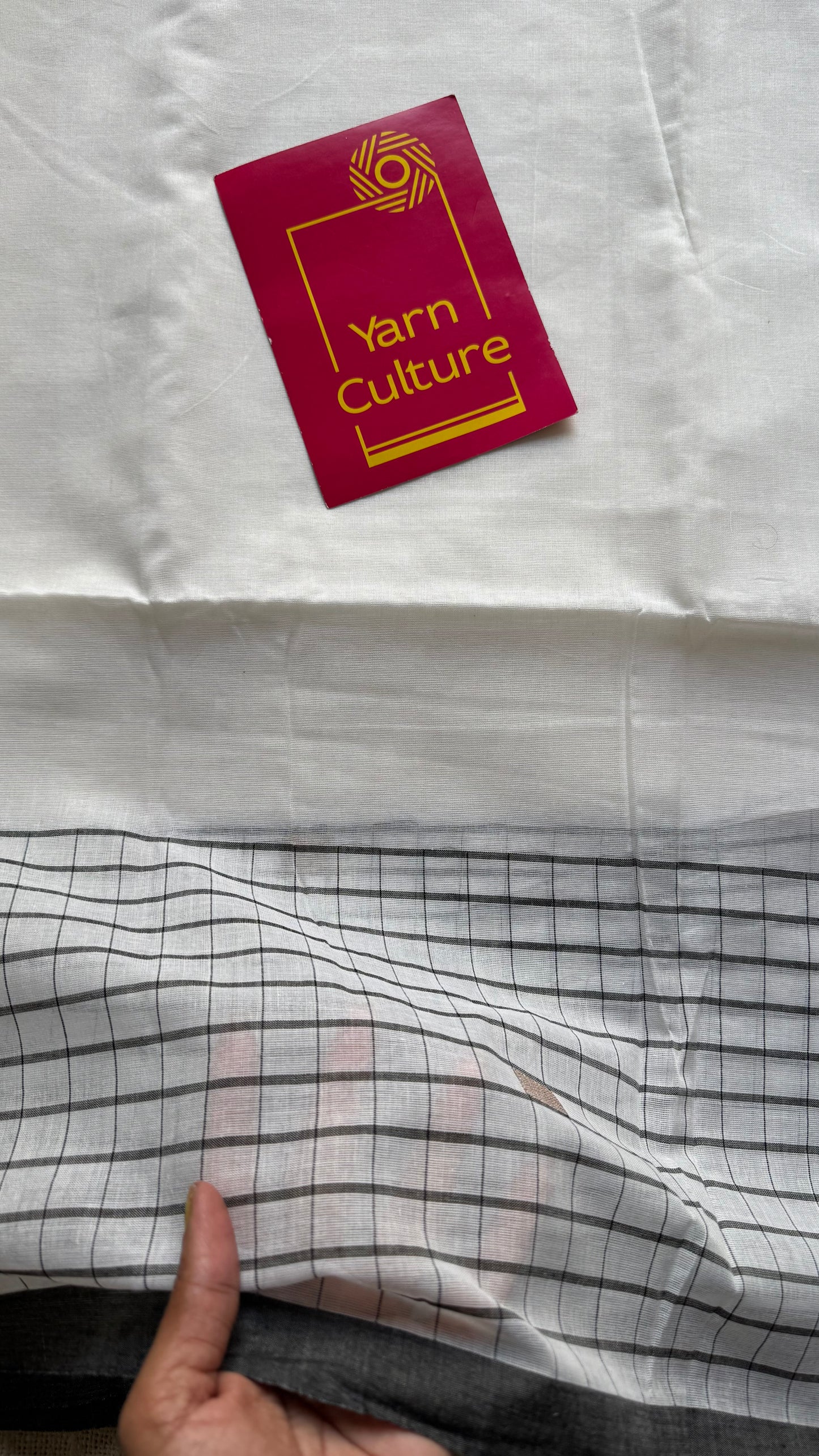 Ivory handloom mul saree with black checkered borders and antique gold buttas - YCBCMCFE170