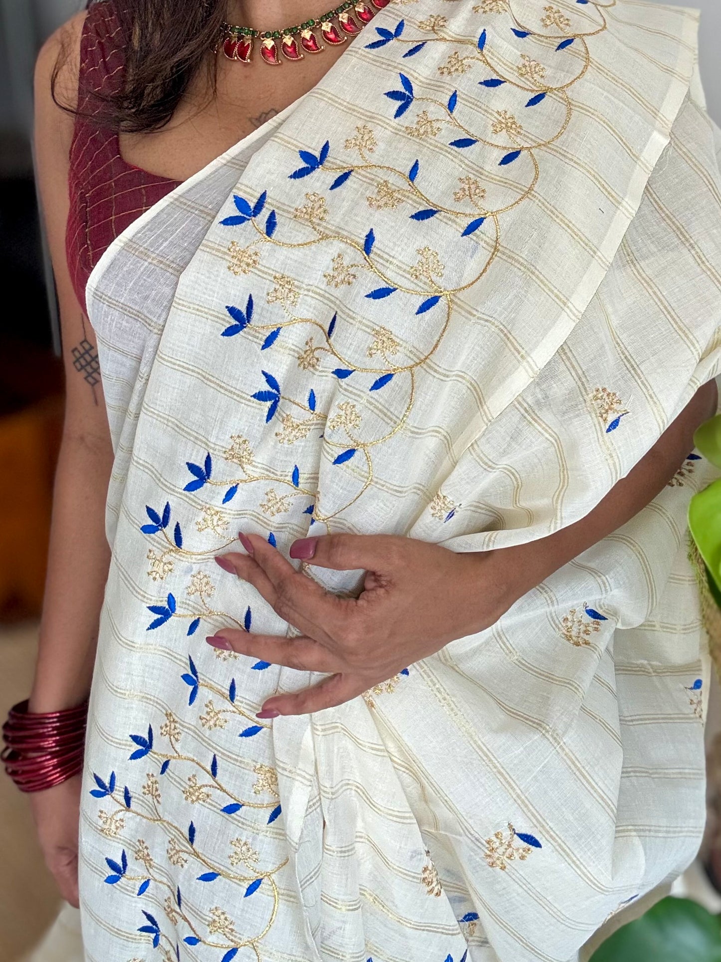 Ivory and gold soft cotton saree, blue floral vine embroidery  - YCIEON55