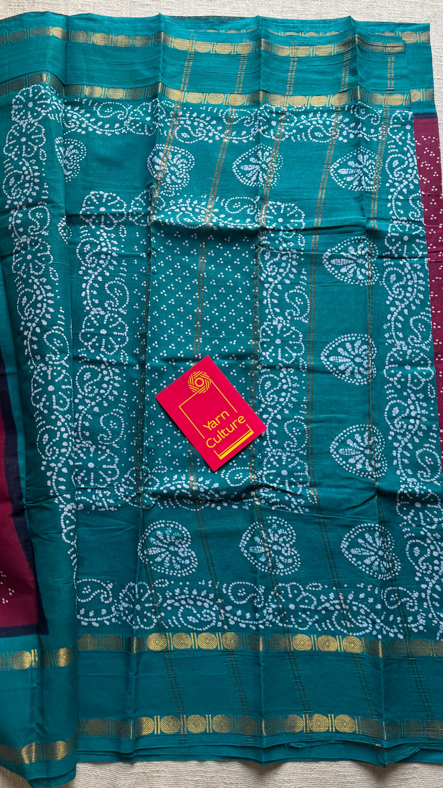Reddish pink with dark turquoise contrast border, kattuchayam dyed madurai sungudi cotton saree - YCCOTNMSFE81