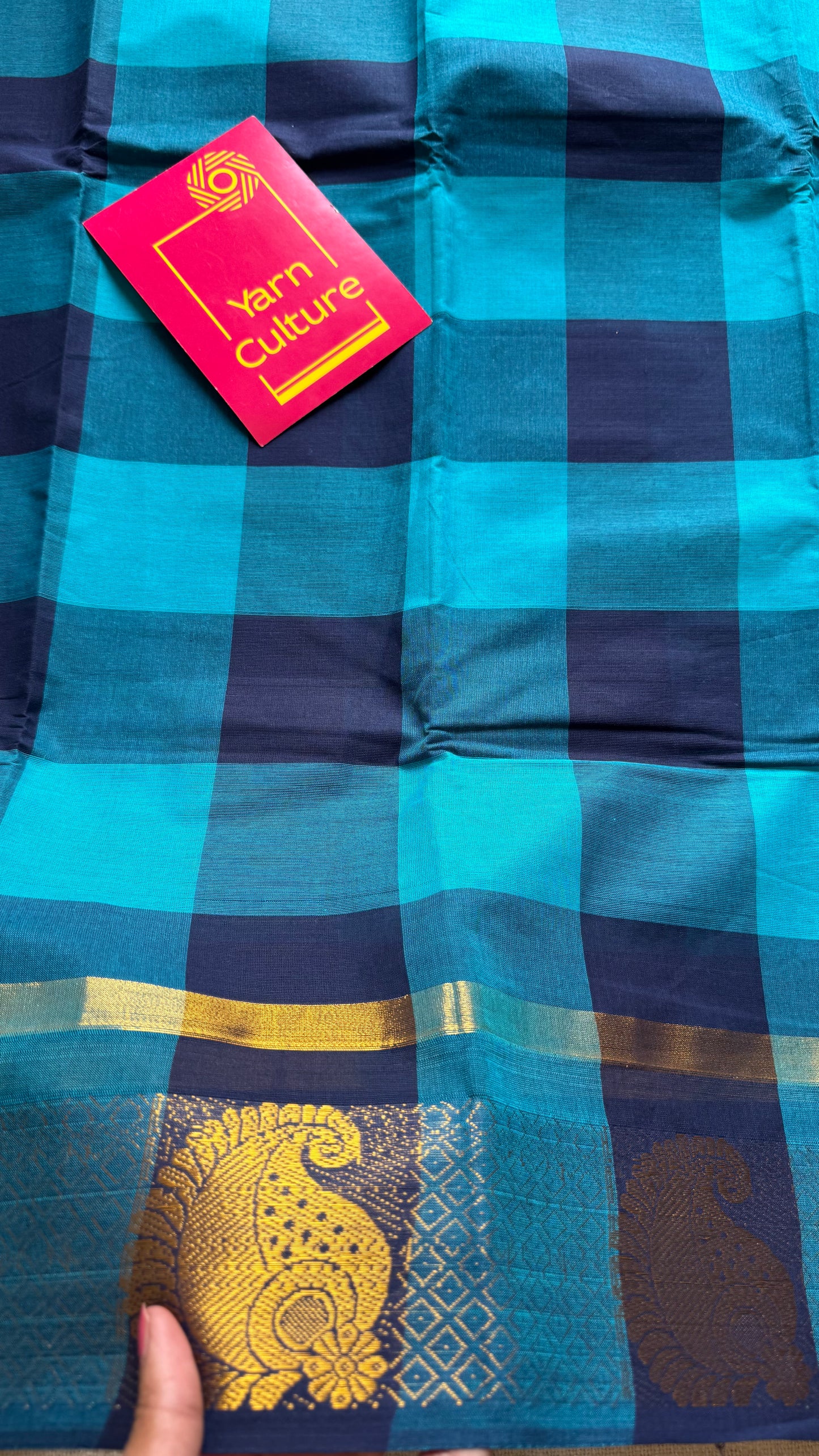 Chettinad cotton saree with sky blue and navy checks, paisley motif border - YCCOTNAP62
