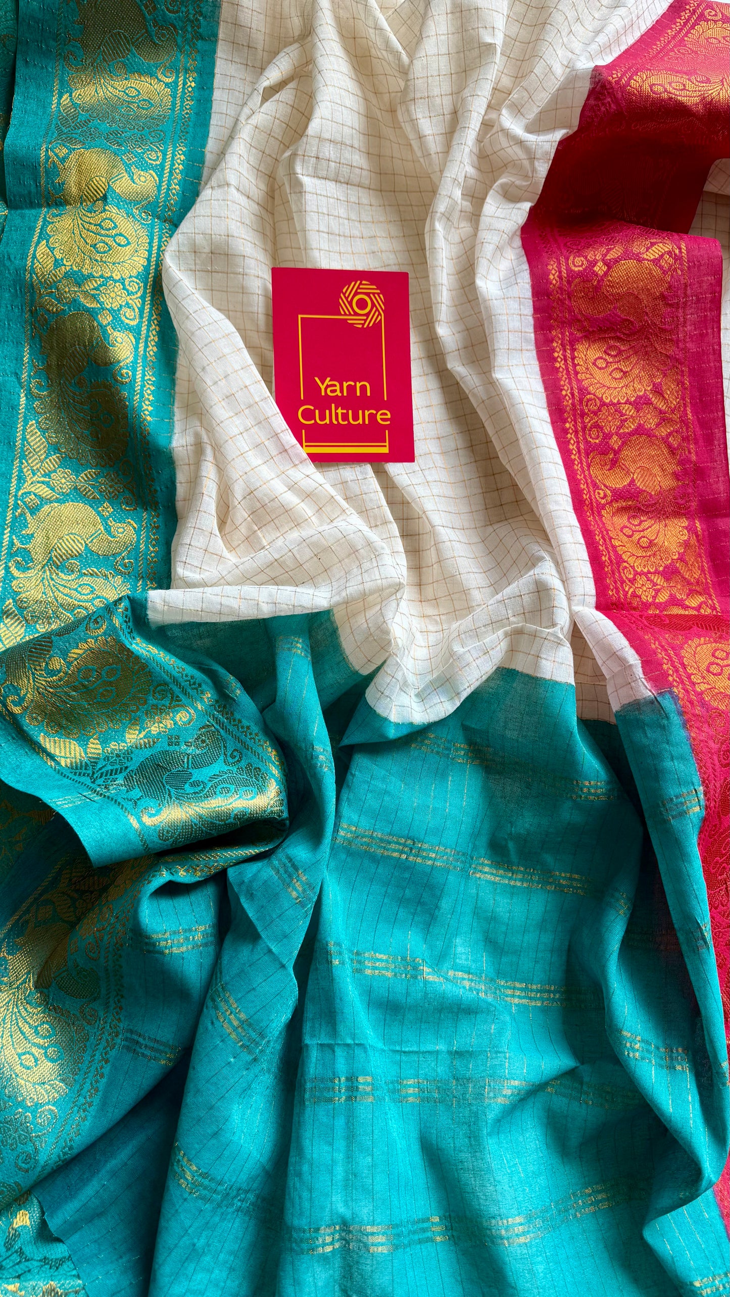 Karthika : Shalabham - Sungudi checks, ivory gold base, red and turquoise blue dual tone border, soft cotton - YCIEON163