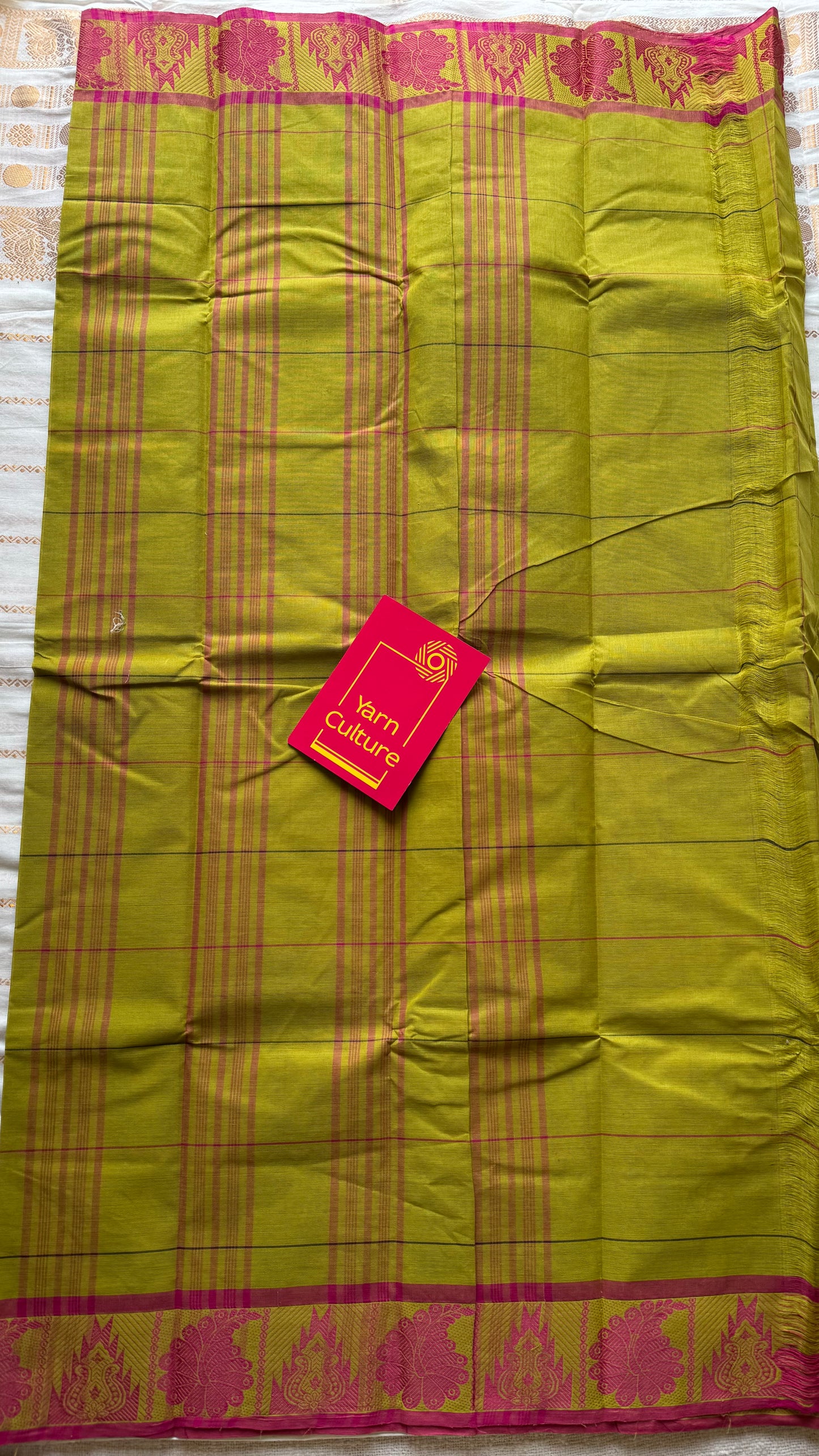 Chettinad cotton saree with lime green and pink checks, thread motif border - YCCOTNJUCC04