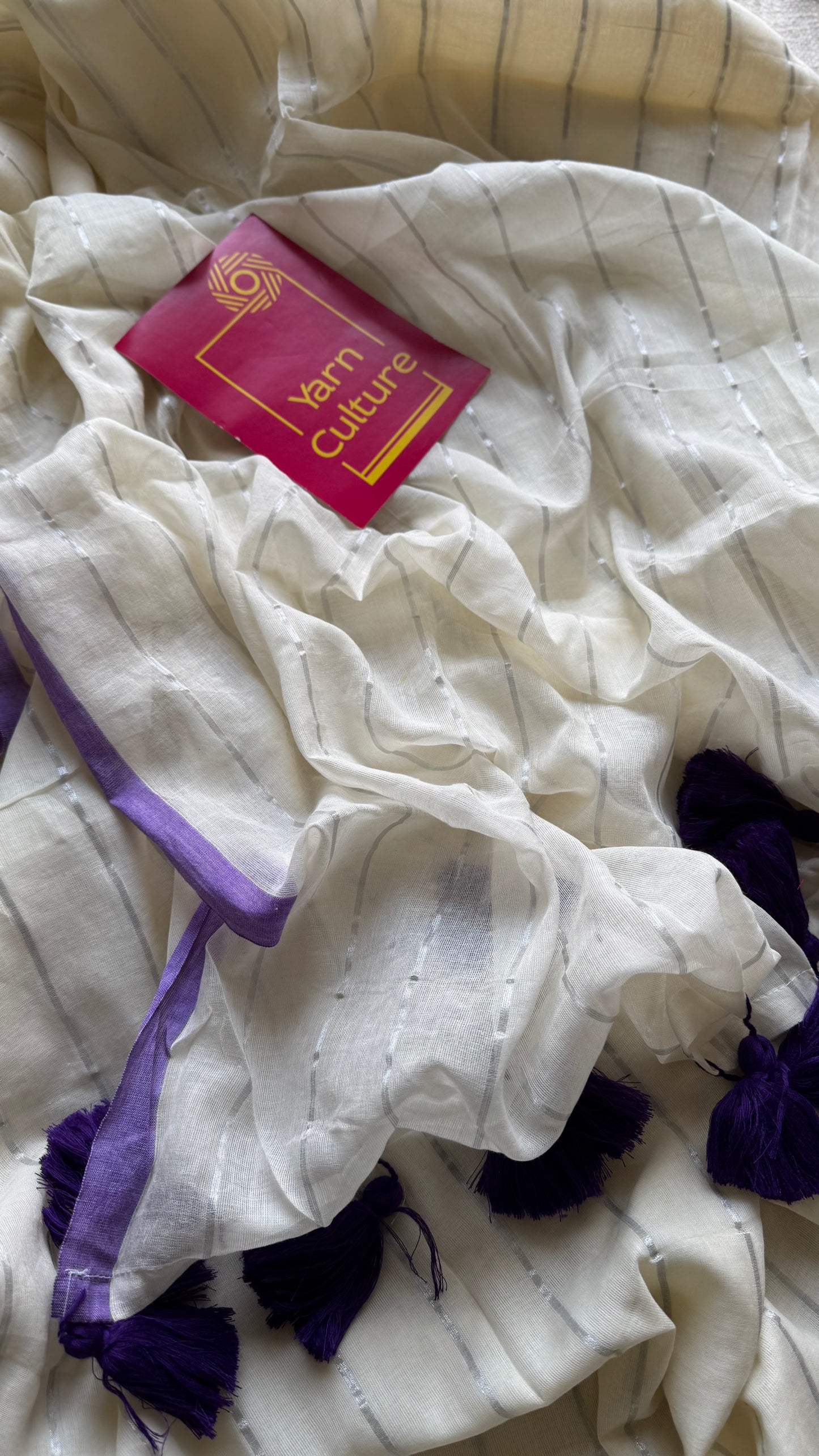 Ivory mul saree with silver zari stripes and purple border - YCBCMCFE288