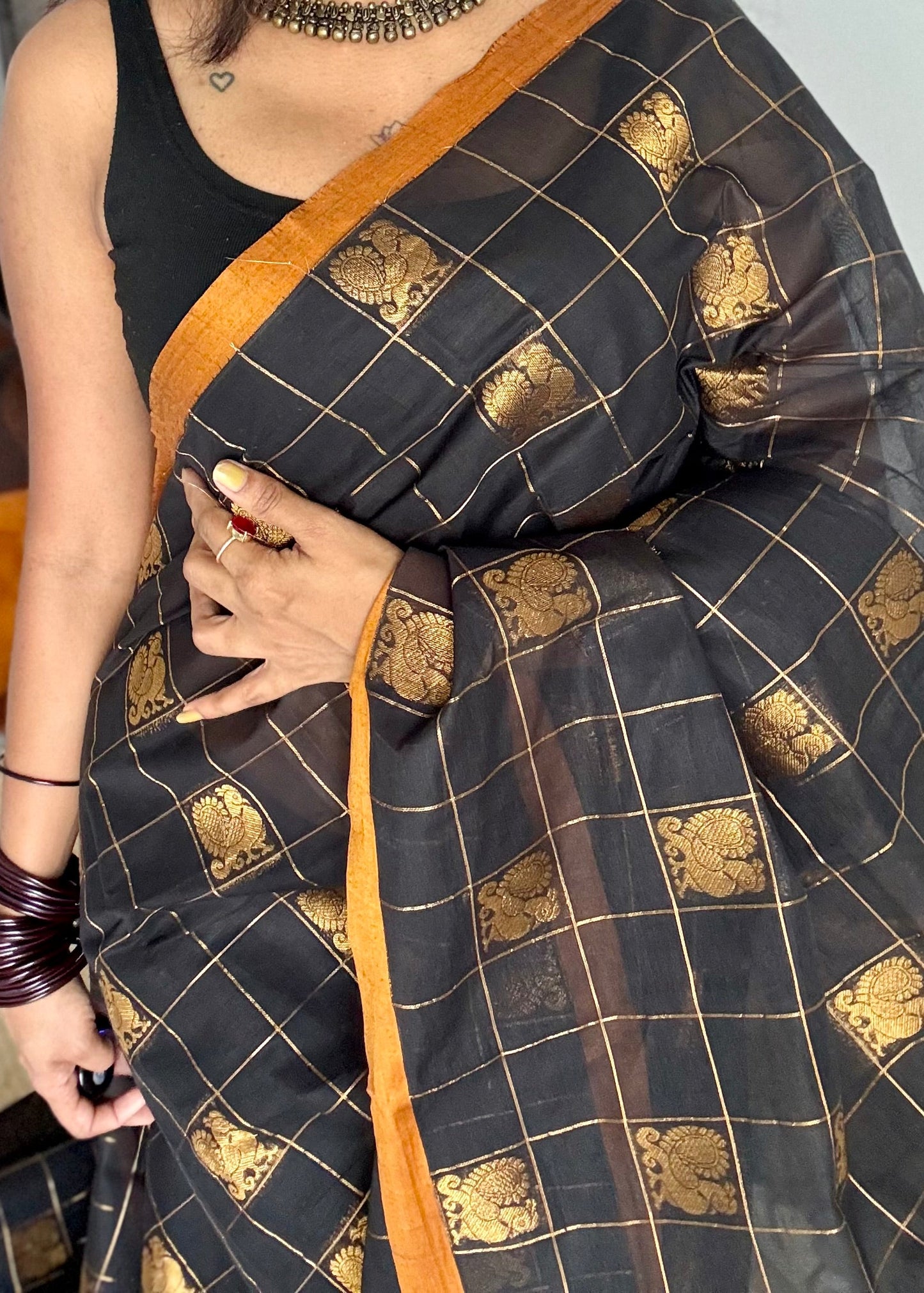 Kanchi cotton saree, peacock motif saree, Kanchivaram inspired design, South Indian cotton saree, traditional checked saree, Kanchi cotton saree with peacock design