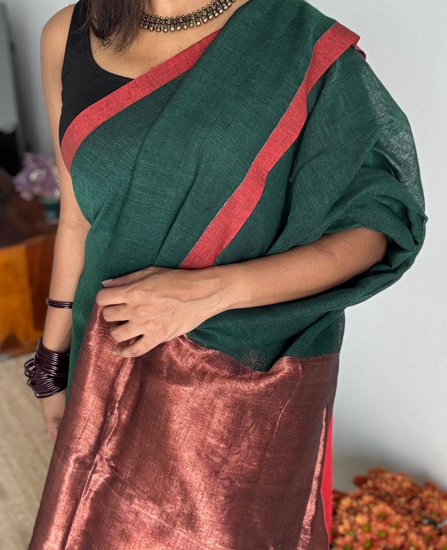 Dark green plain linen by cotton saree with copper zari pallu - YCBCLCFE397