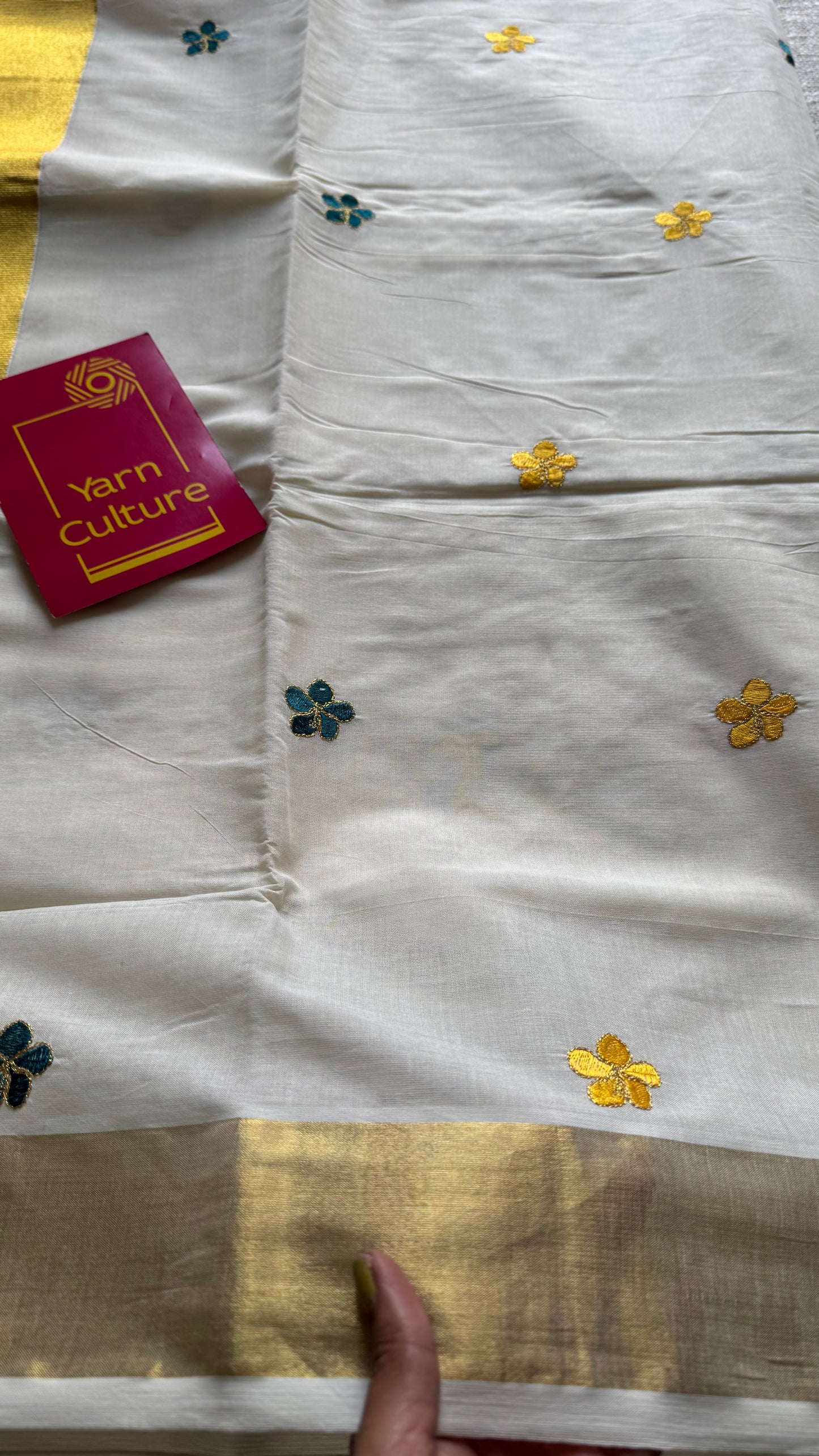 Ivory and gold saree with peacock blue and yellow floral embroidery - YCIEKCFE309