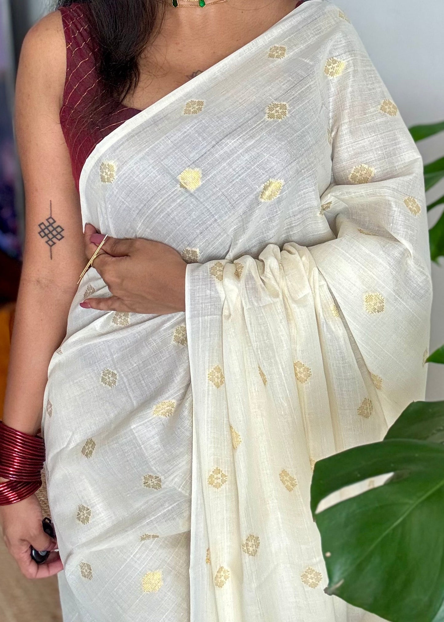 Ivory and gold kerala saree with woven buttas, striped pallu - YCIEON43