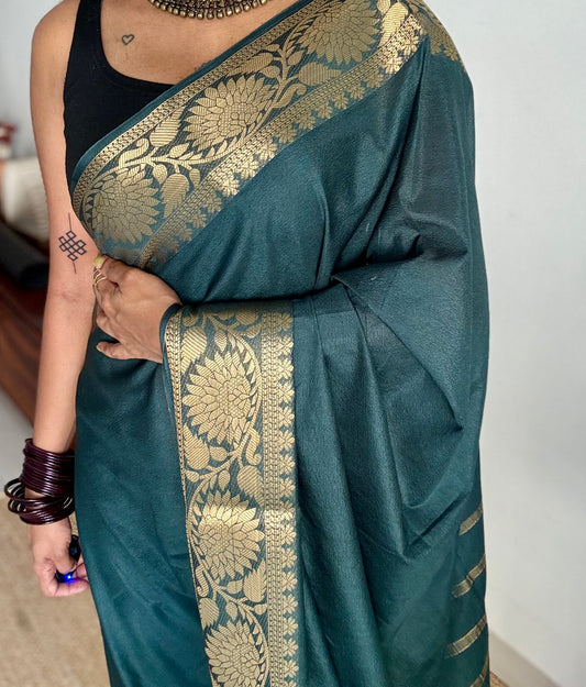 Dark green, semi crepe silk saree with antique gold floral border - YCLOKOC57