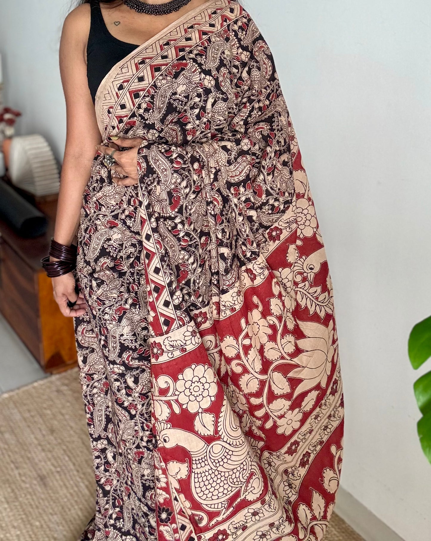 Black with red kalamkari saree, floral vines, soft cotton - YCWOTDMA352
