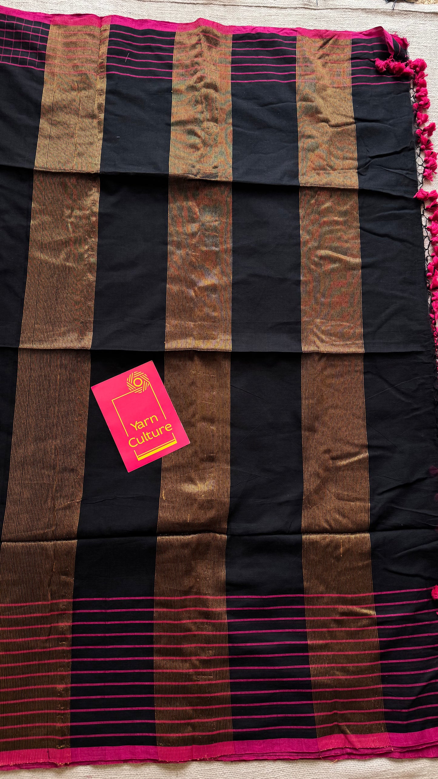 Black handloom mul saree with pink checkered borders and antique gold buttas - YCBCMCFE385