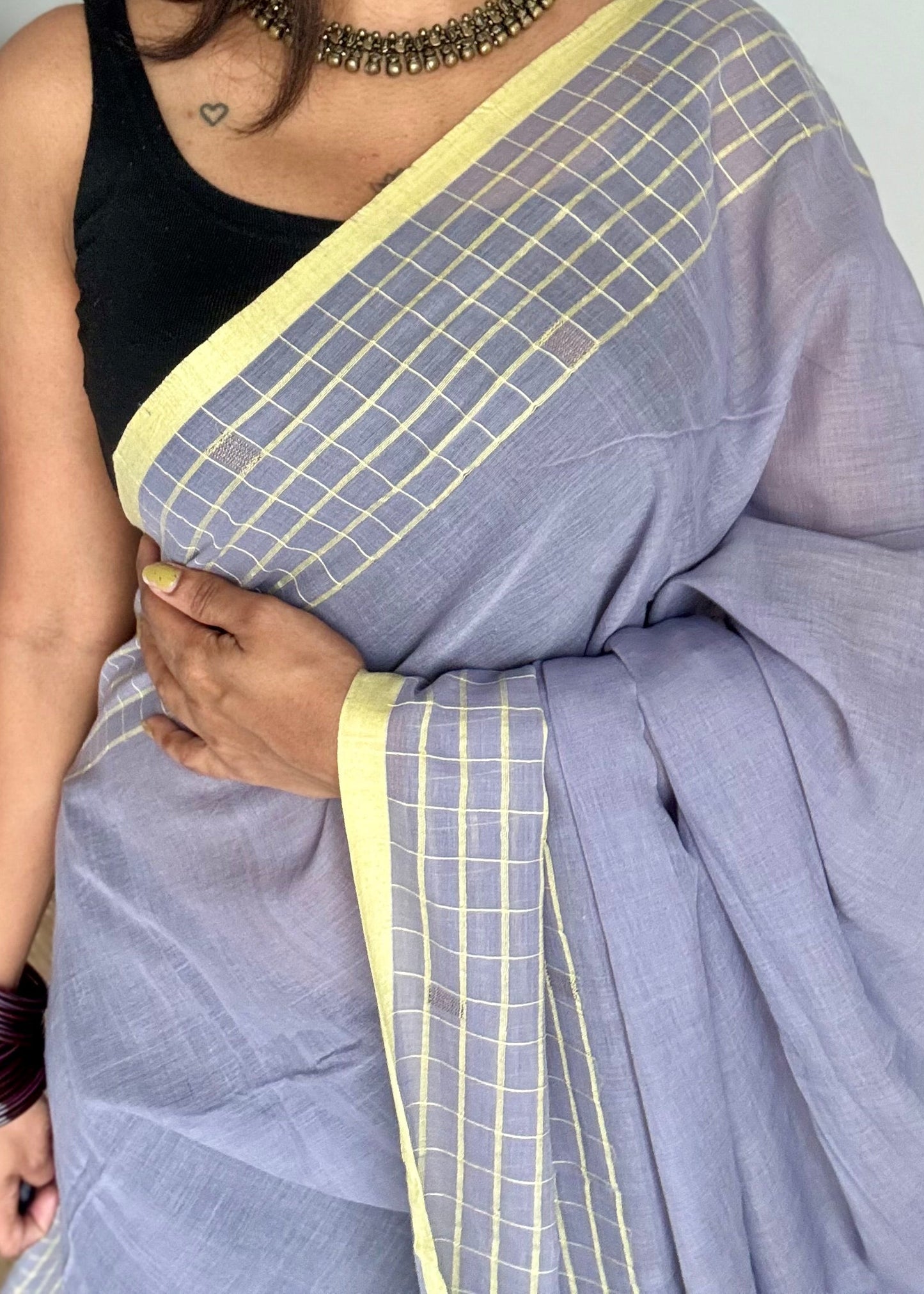 Grey handloom mul saree with custard yellow checkered borders and antique gold buttas - YCBCMCFE387