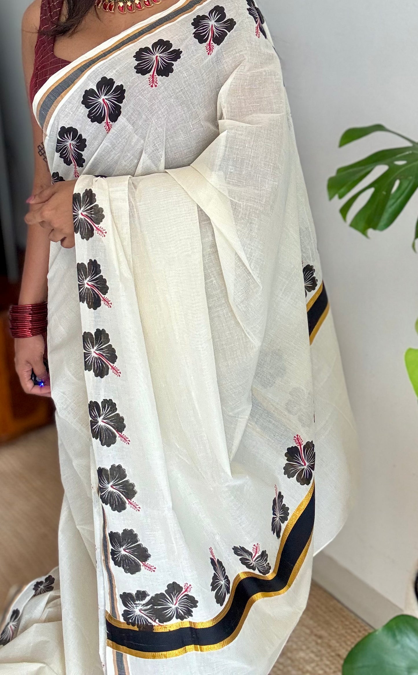 Ivory and gold soft cotton saree, black hibiscus (chembarathi) flowers - YCIEON61