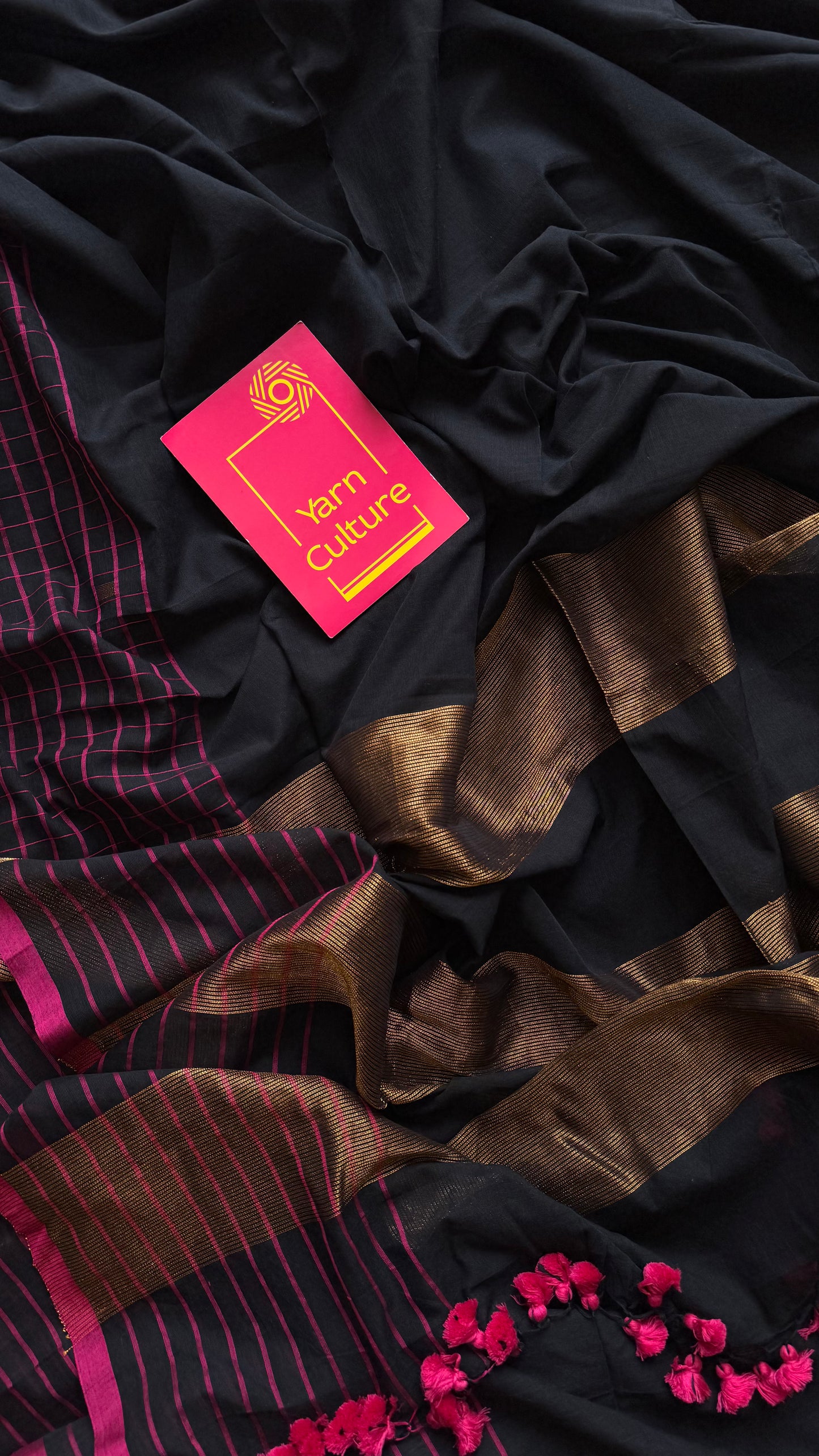 Black handloom mul saree with pink checkered borders and antique gold buttas - YCBCMCFE385