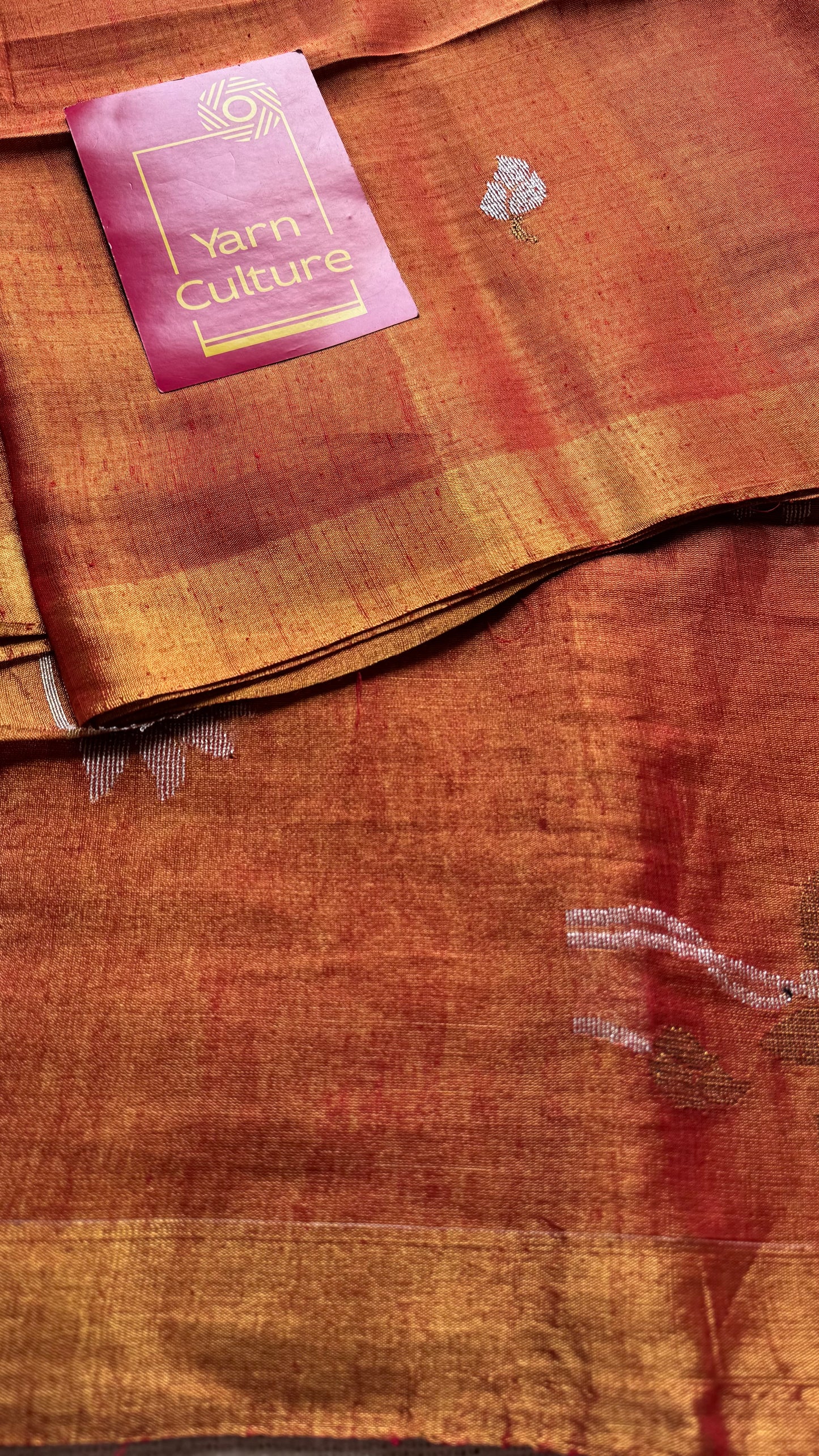Handwoven orange gold dual tone tissue linen saree with lotus motifs - YCBCLTFE399
