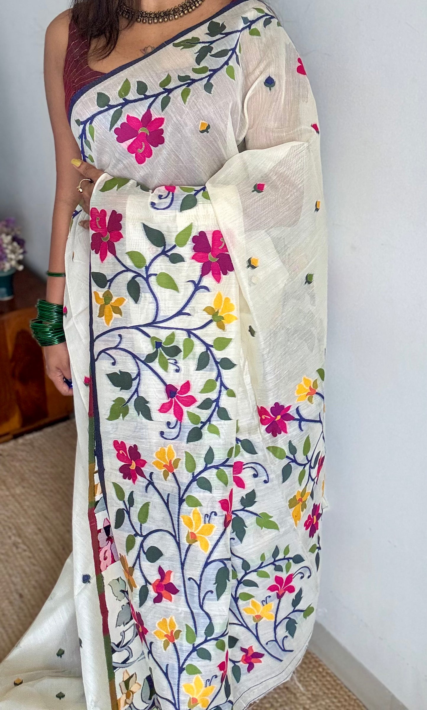 Ivory with navy blue border and multicolour floral motifs, cotton saree - YCIEBCFE325