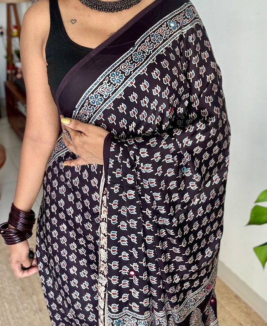 Black pure modal silk saree with ajrakh handblock print and mirror work - YCTOKAJM337