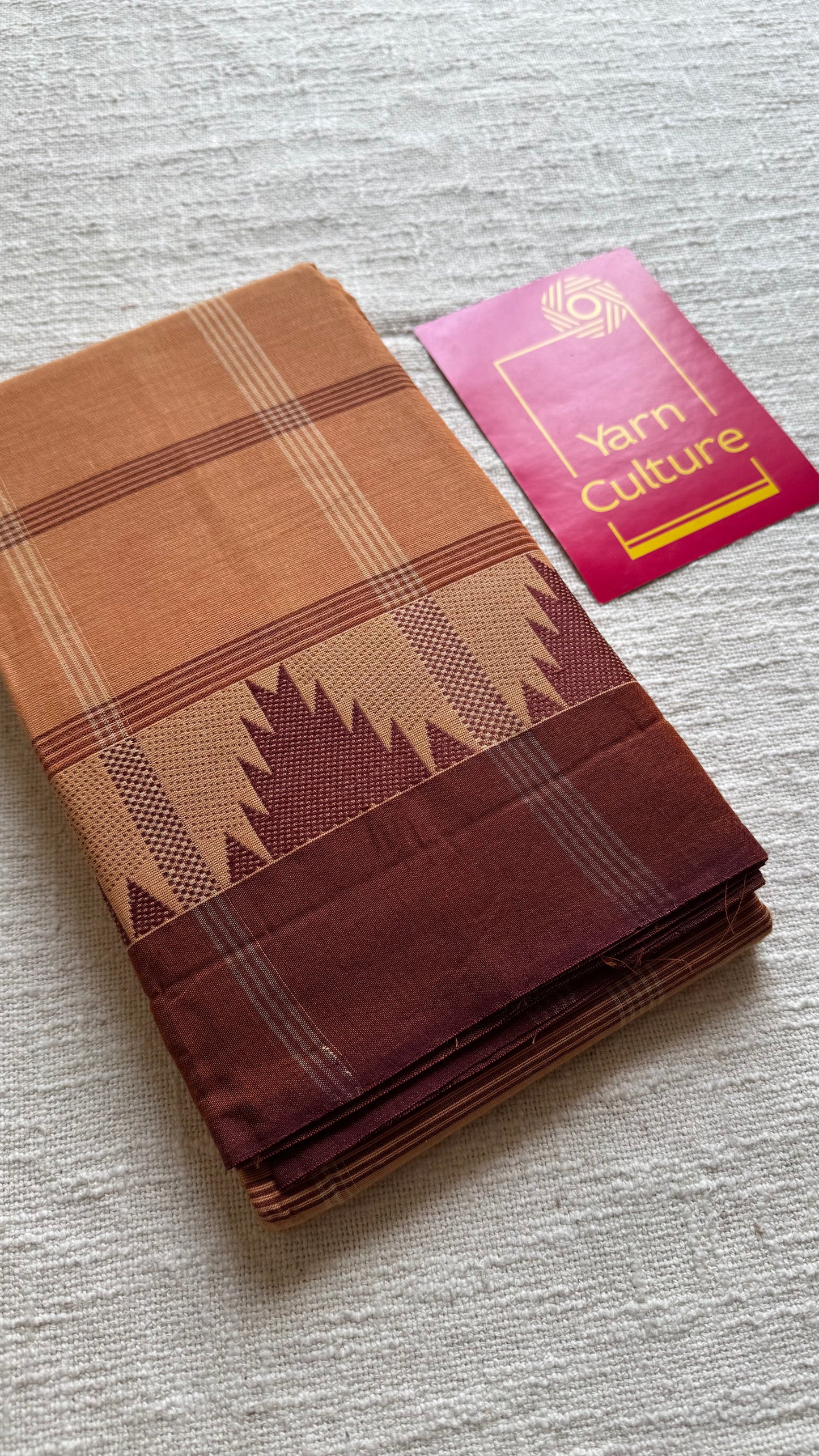 Chettinad cotton saree with light brown and dark brown checks, temple motif border - YCCOTNAP71