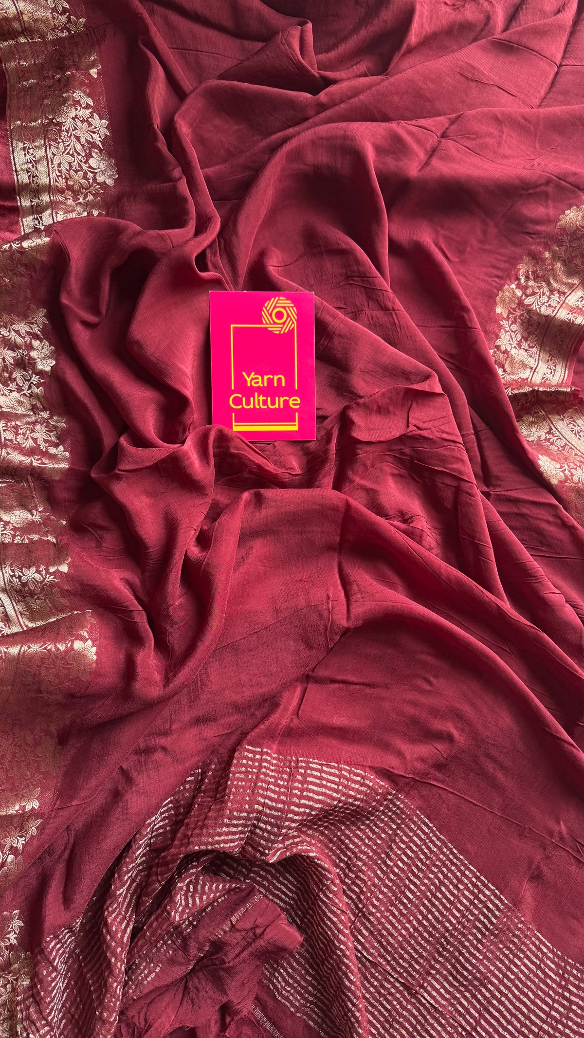Maroon, semi crepe silk saree with antique gold floral border - YCLOKOC52