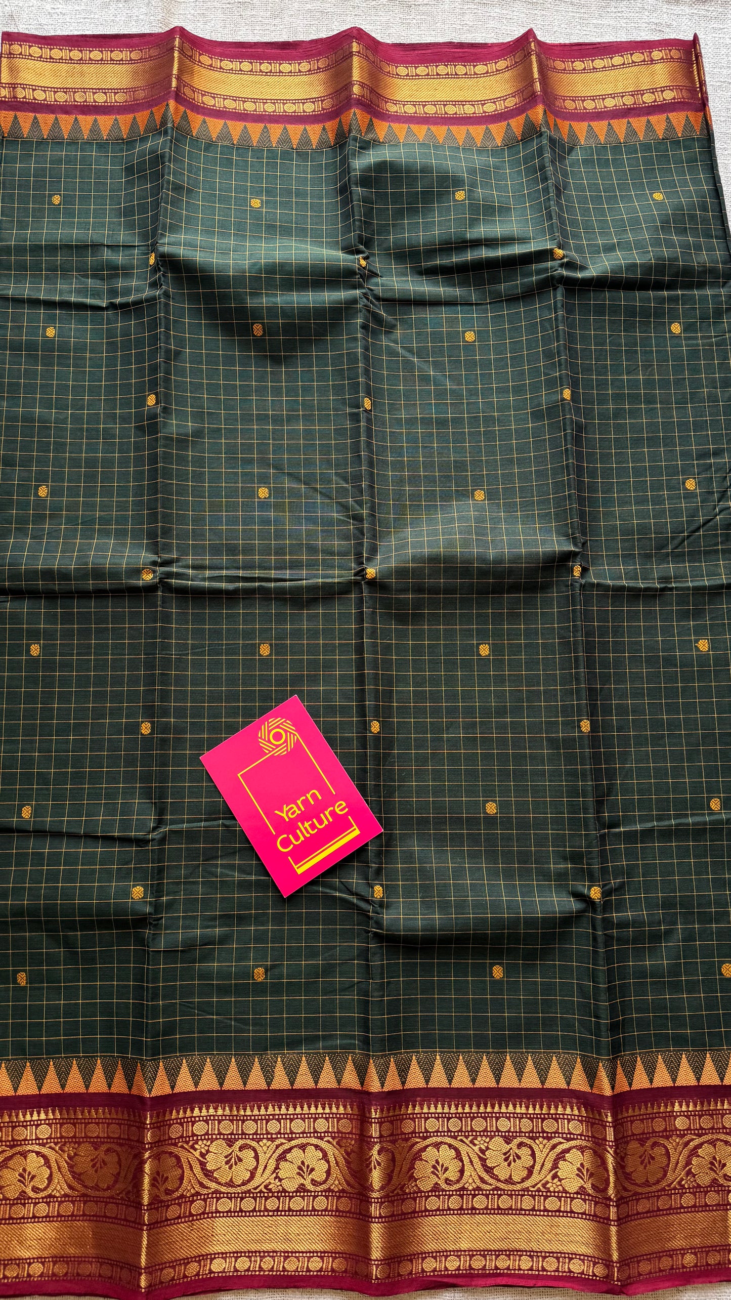 Dark green Kanchi cotton saree with checks, woven buttas and red zari border - YCCOTNCCFE161