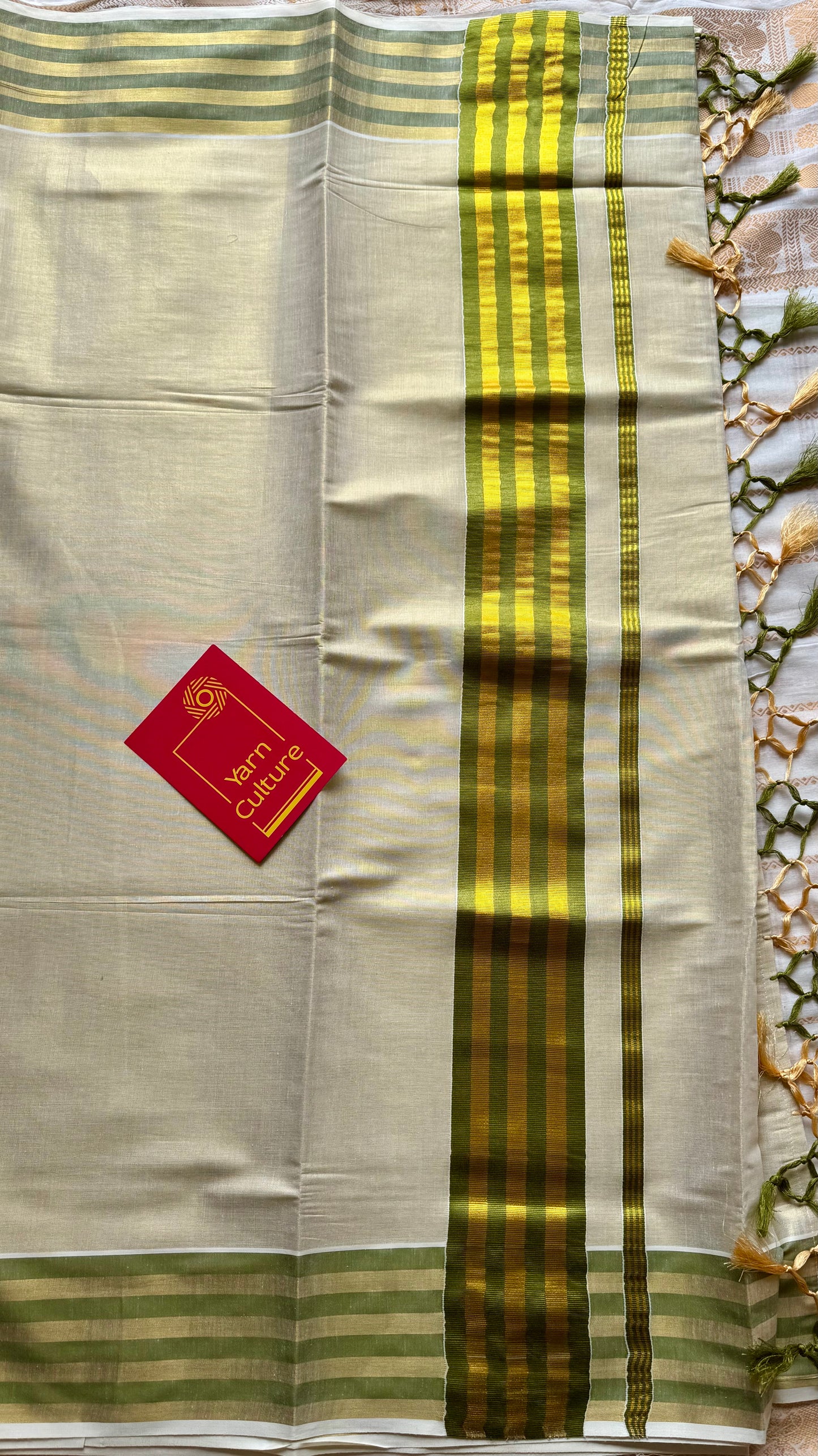Ivory and gold soft tissue cotton saree, light green border - YCIEON65