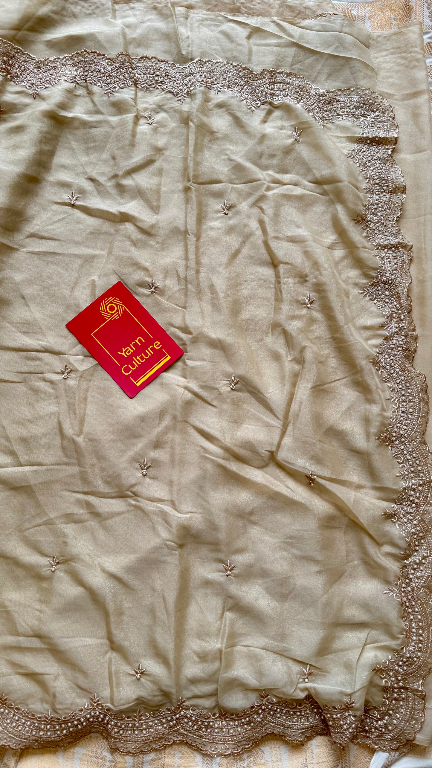 Gold soft chiffon saree, with pearl embellished border - YCIEON85