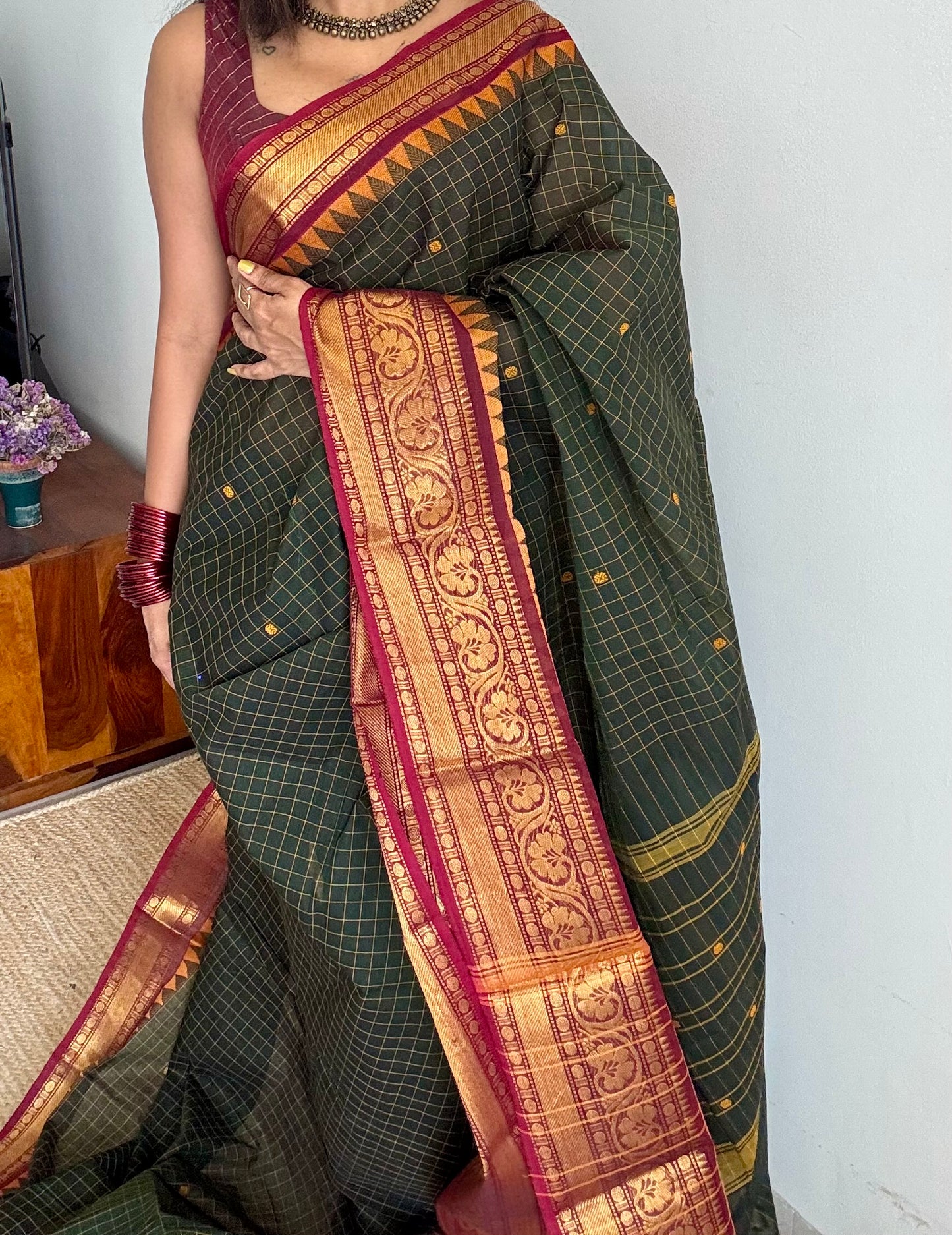 Dark green Kanchi cotton saree with checks, woven buttas and red zari border - YCCOTNCCFE161