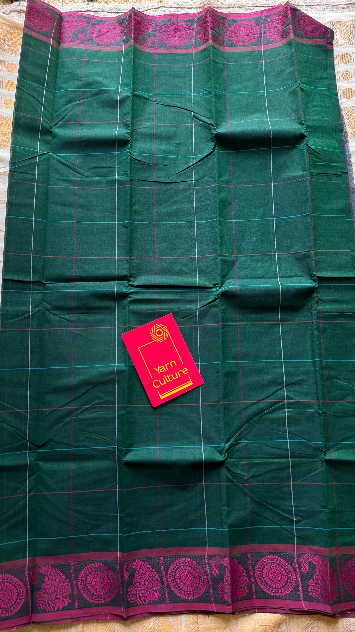Chettinad cotton saree in dark green with pink checks, thread motif border - YCCOTNJUCC05