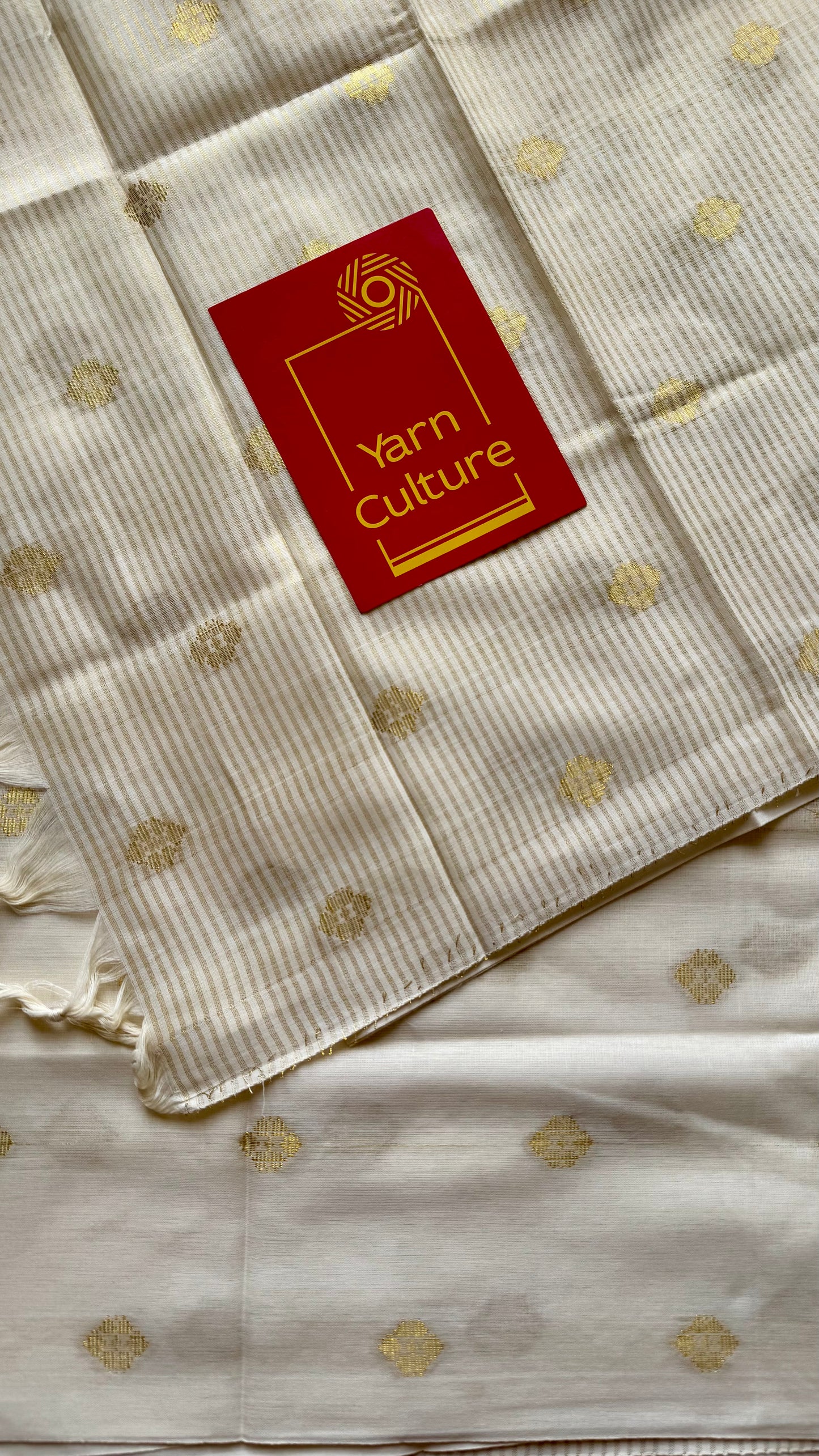 Ivory and gold kerala saree with woven buttas, striped pallu - YCIEON43