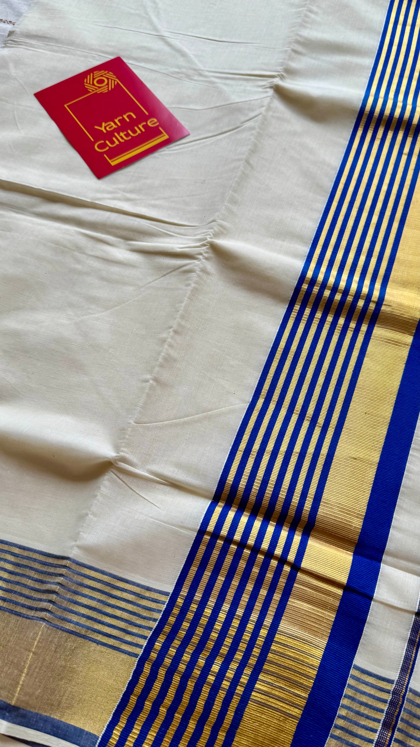 Ivory and gold soft cotton saree, royal blue border - YCIEON77