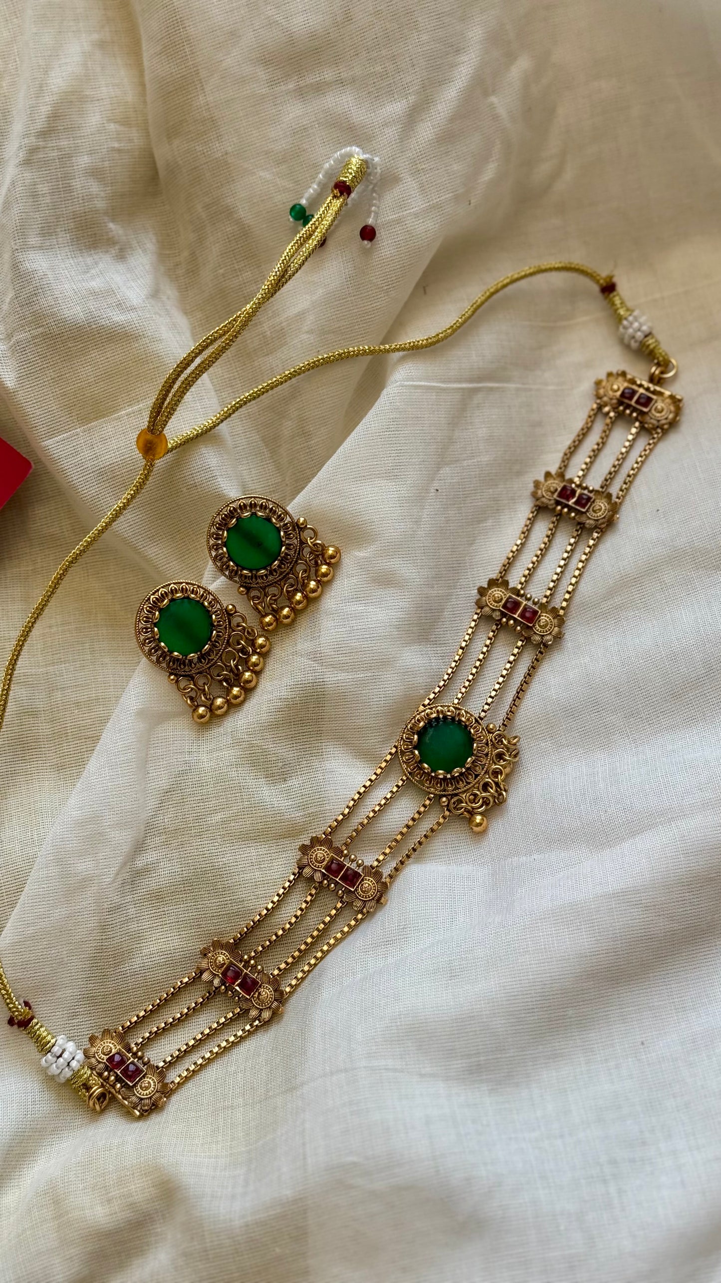 4 layered choker neckpiece with green pendant, with earrings - YCGPNP627