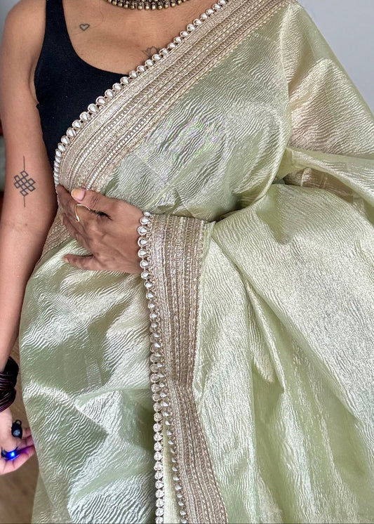 Pastel pista green crushed Banarasi tissue saree, with pearl lace border - YCBLTOC64