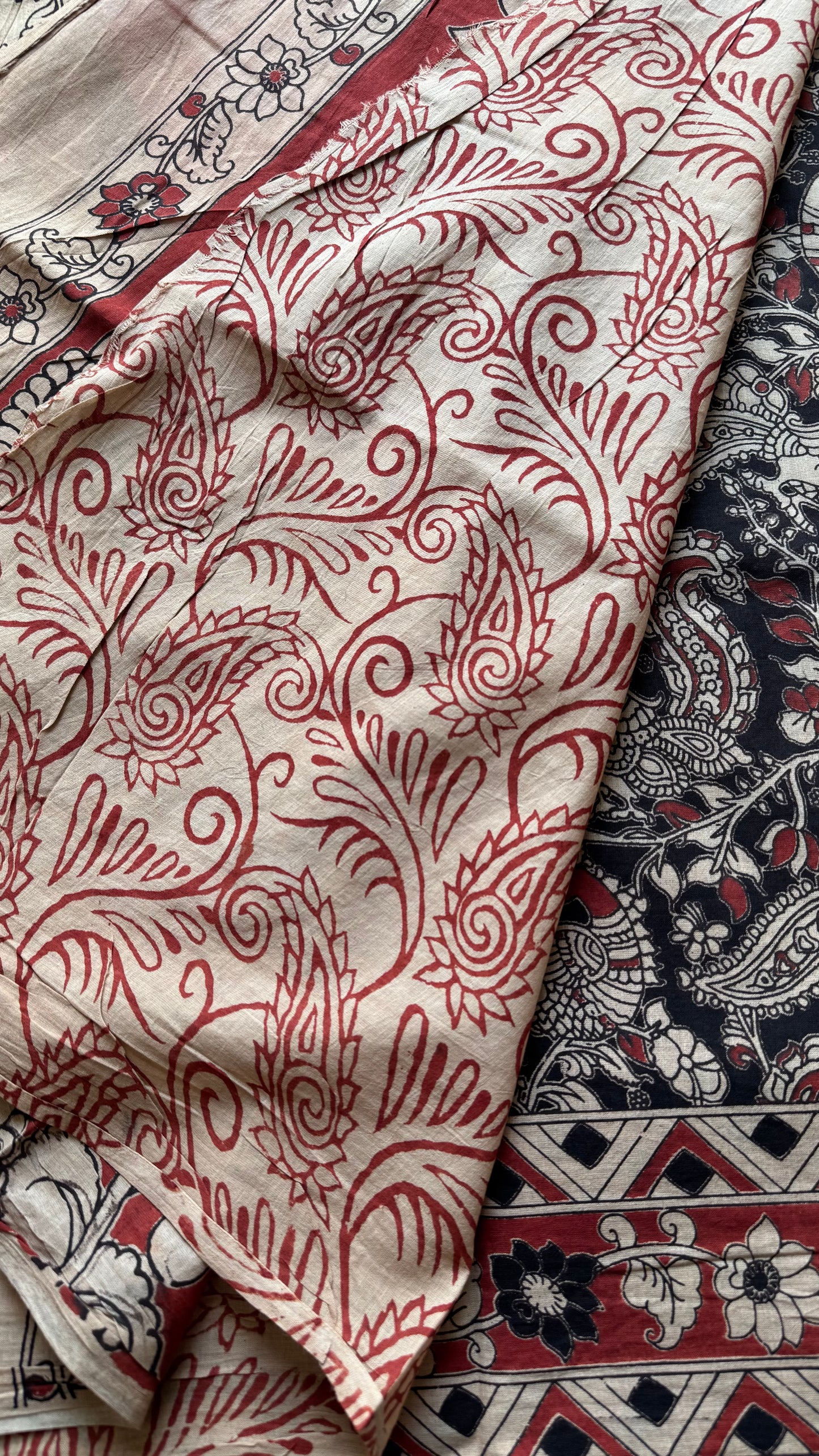 Black with red kalamkari saree, floral vines, soft cotton - YCWOTDMA352