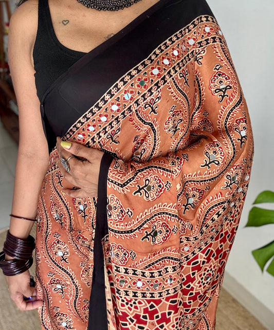 Light clay brown pure modal silk saree with ajrakh handblock print and mirror work, gold zari pallu - YCTOKAJM341