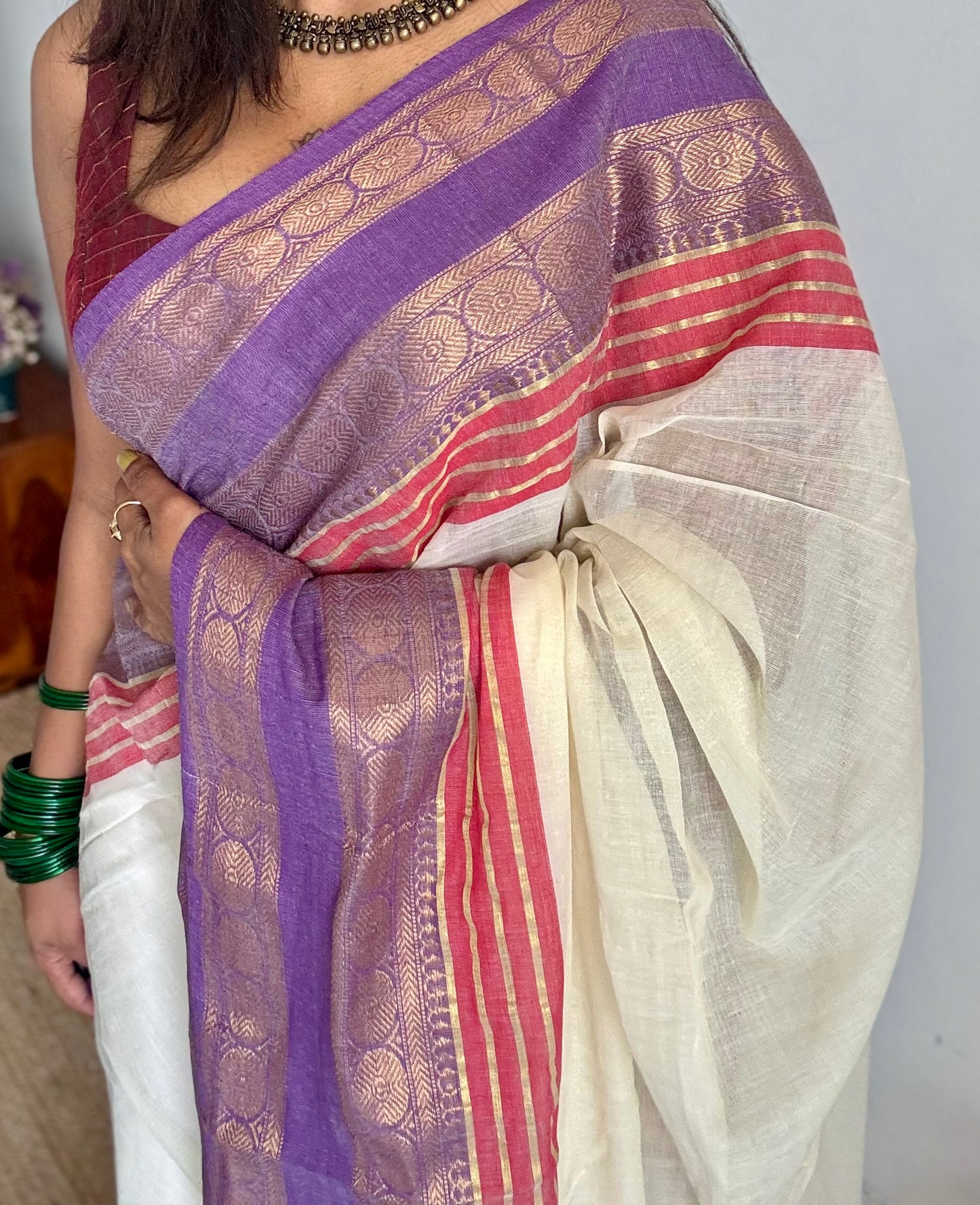 Ivory mul saree with purple and red motif zari border  - YCBCMCFE299