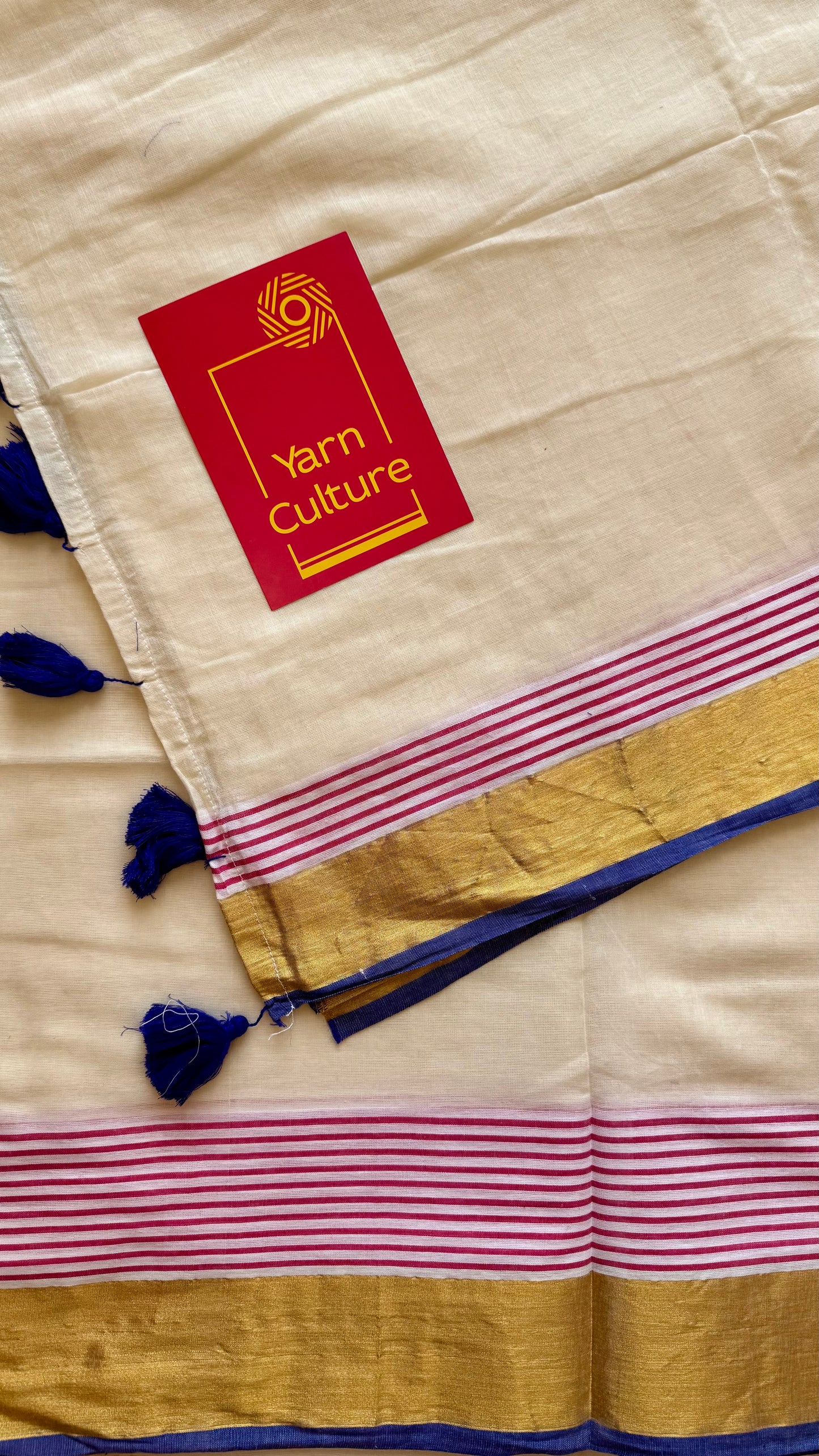Ivory mul saree, blue and red striped border - YCIEON20
