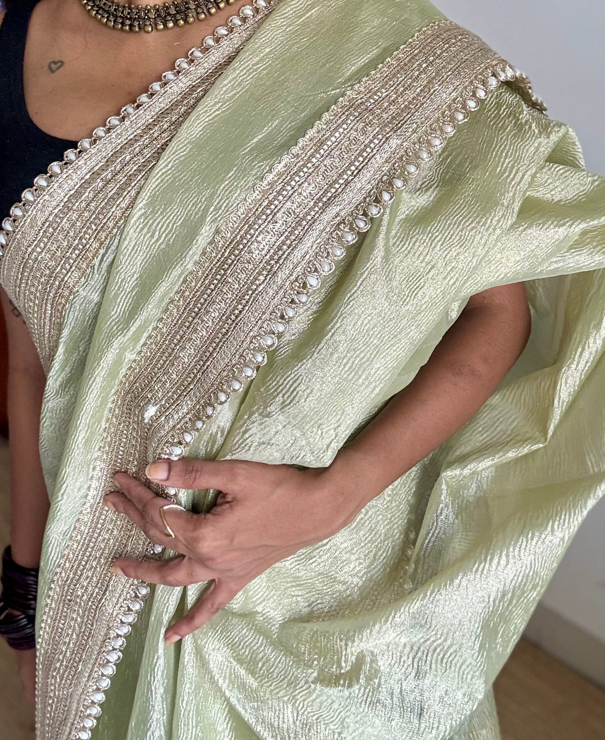 Pastel pista green crushed Banarasi tissue saree, with pearl lace border - YCBLTOC64