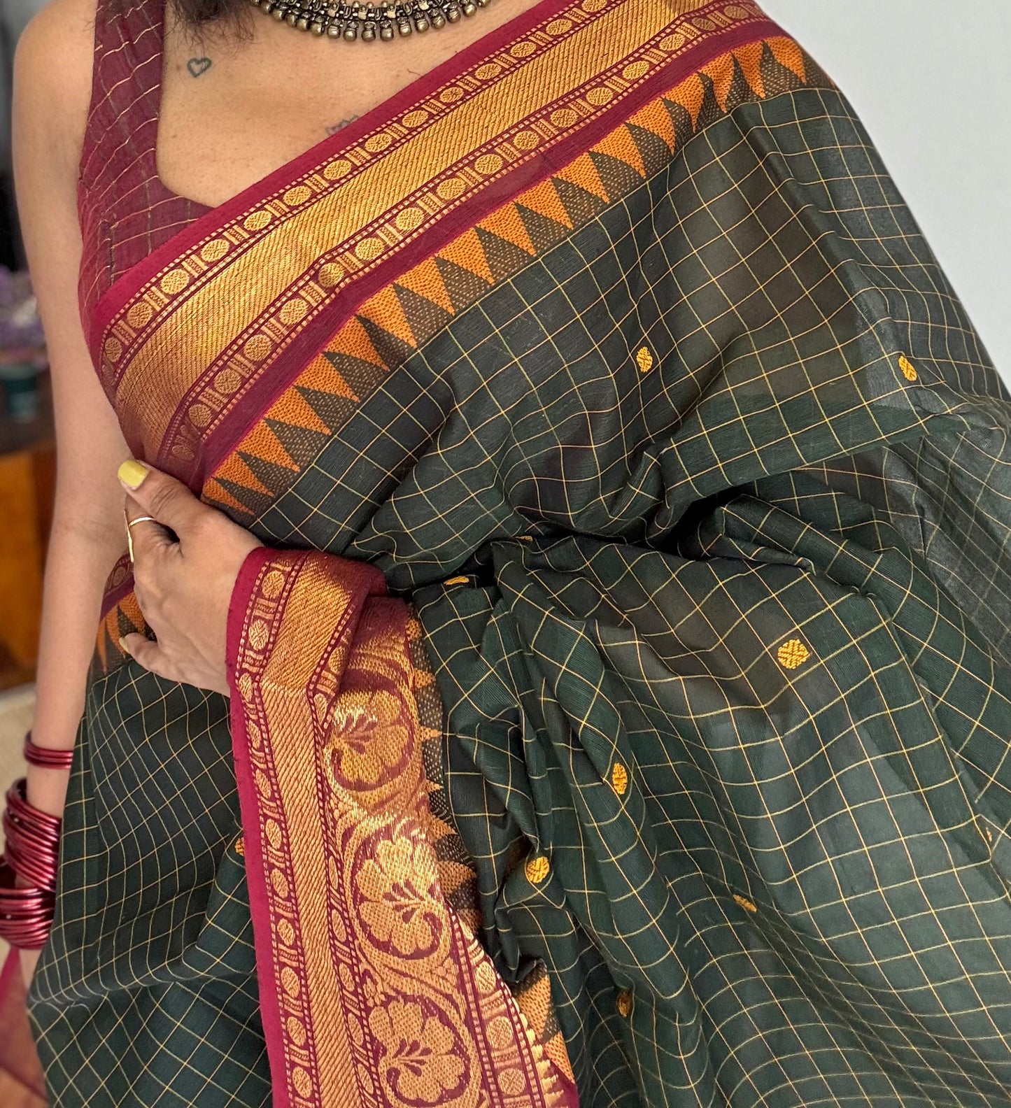 Dark green Kanchi cotton saree with checks, woven buttas and red zari border - YCCOTNCCFE161
