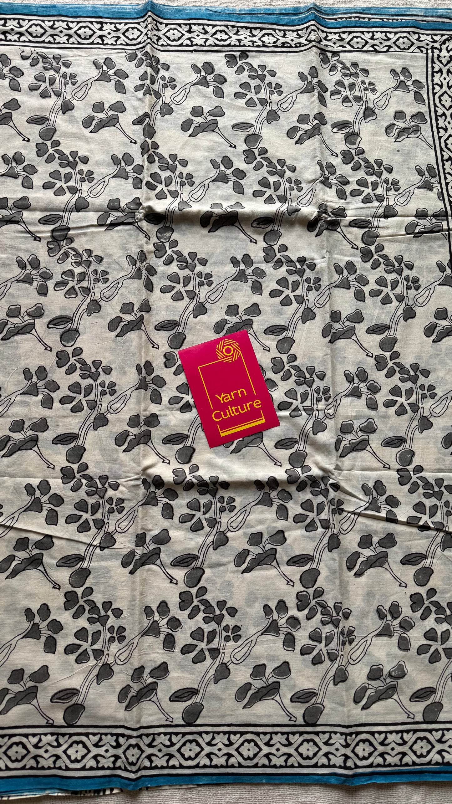 Beige with grey flowers, blue border, block printed soft cotton saree - YCTORCMA14