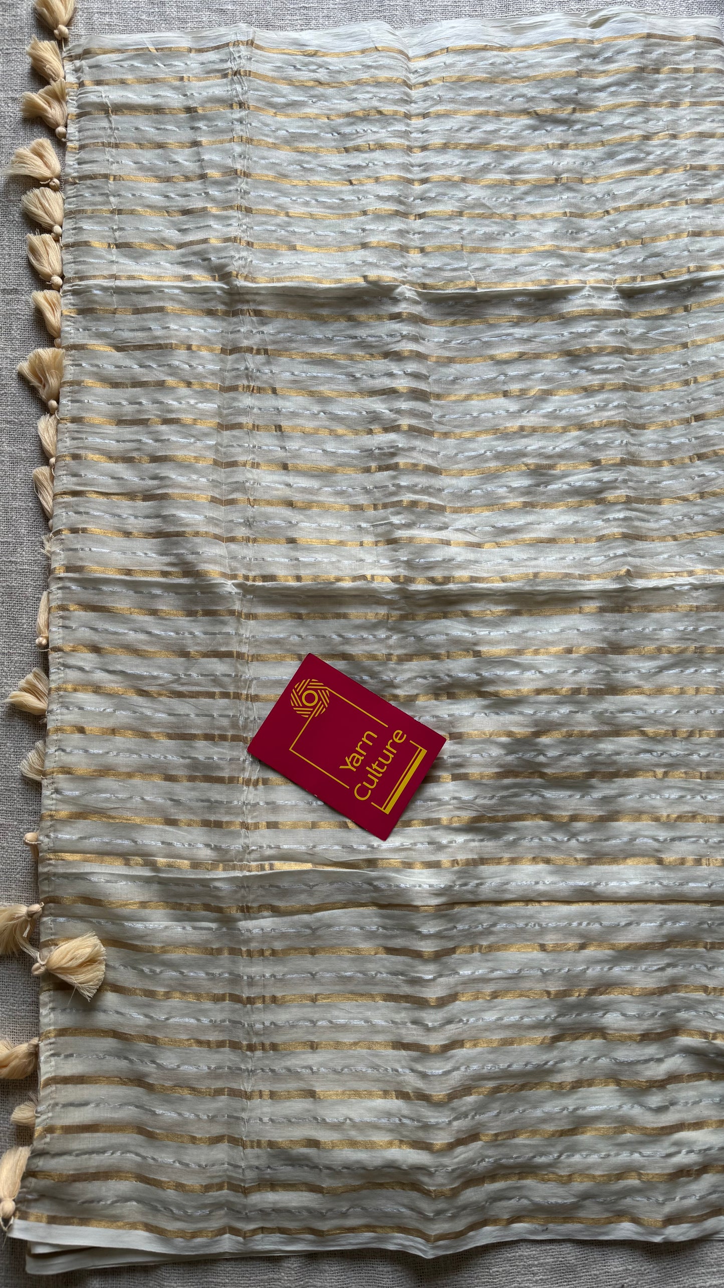 Ivory mul saree with gold and silver stripes - YCBCMCFE298