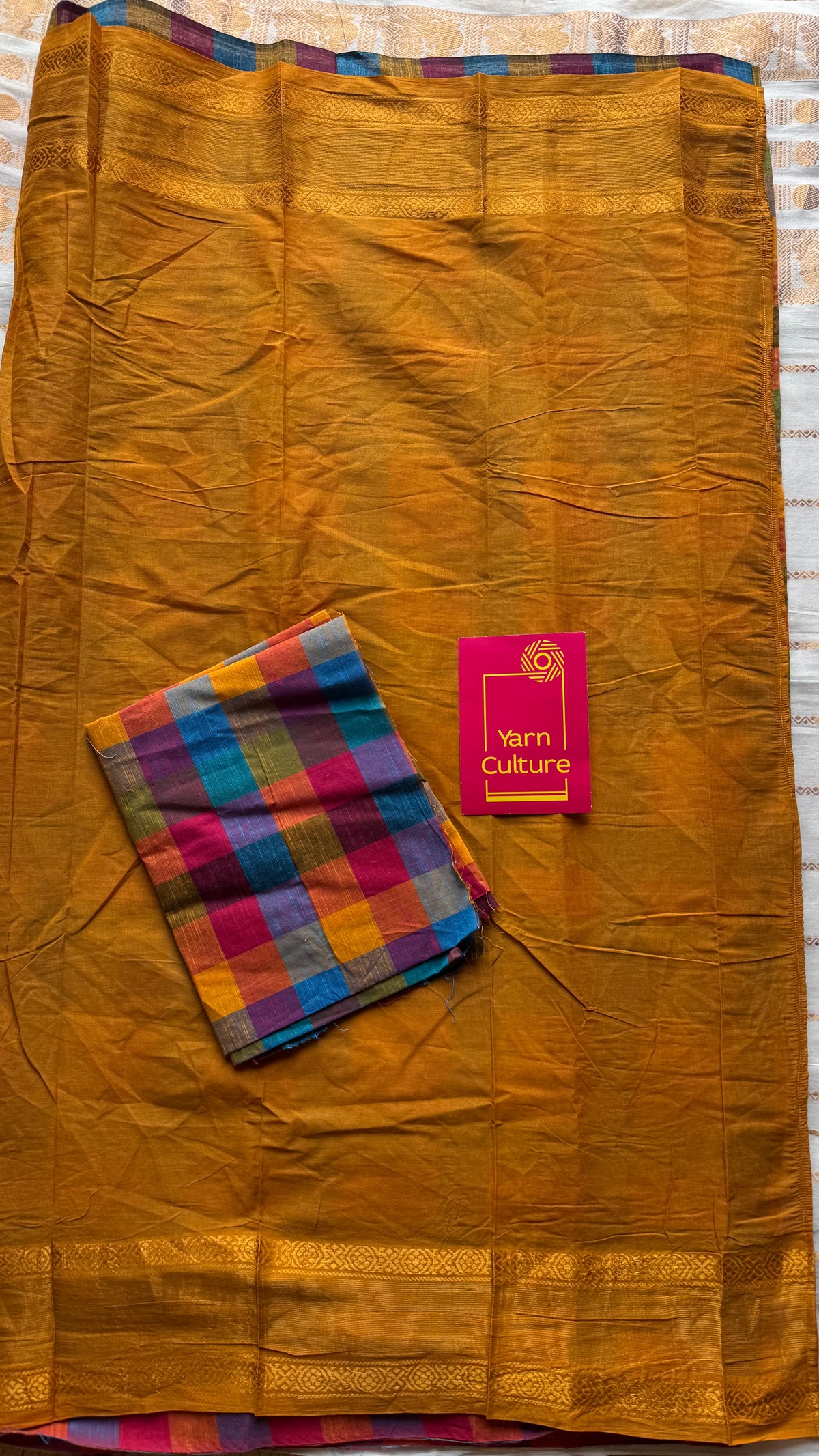 Turmeric yellow with multicoloured madras checks, cotton half and half saree - YCCOTNIDOC161