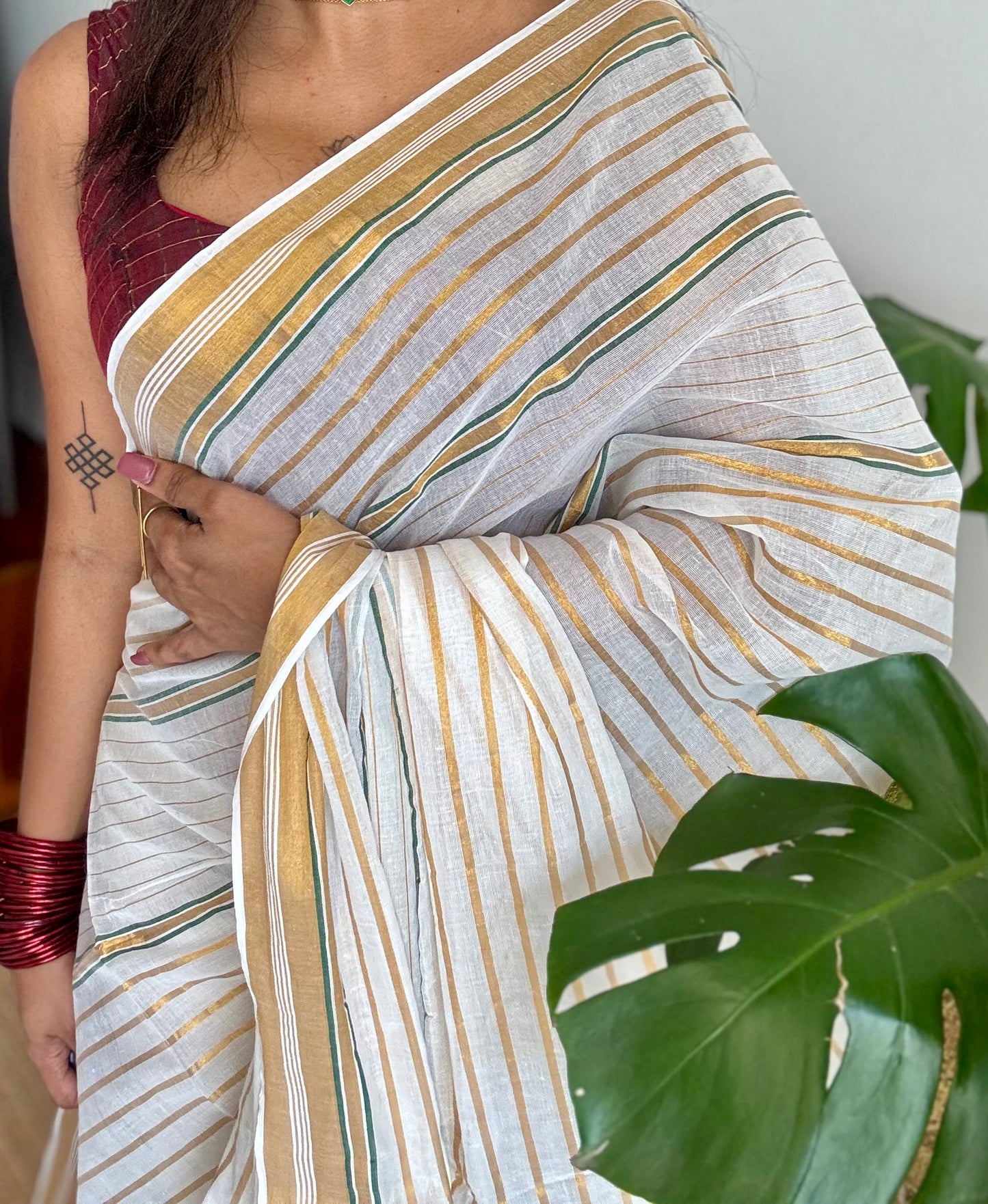 Ivory mul saree, green and gold stripes - YCIEON05