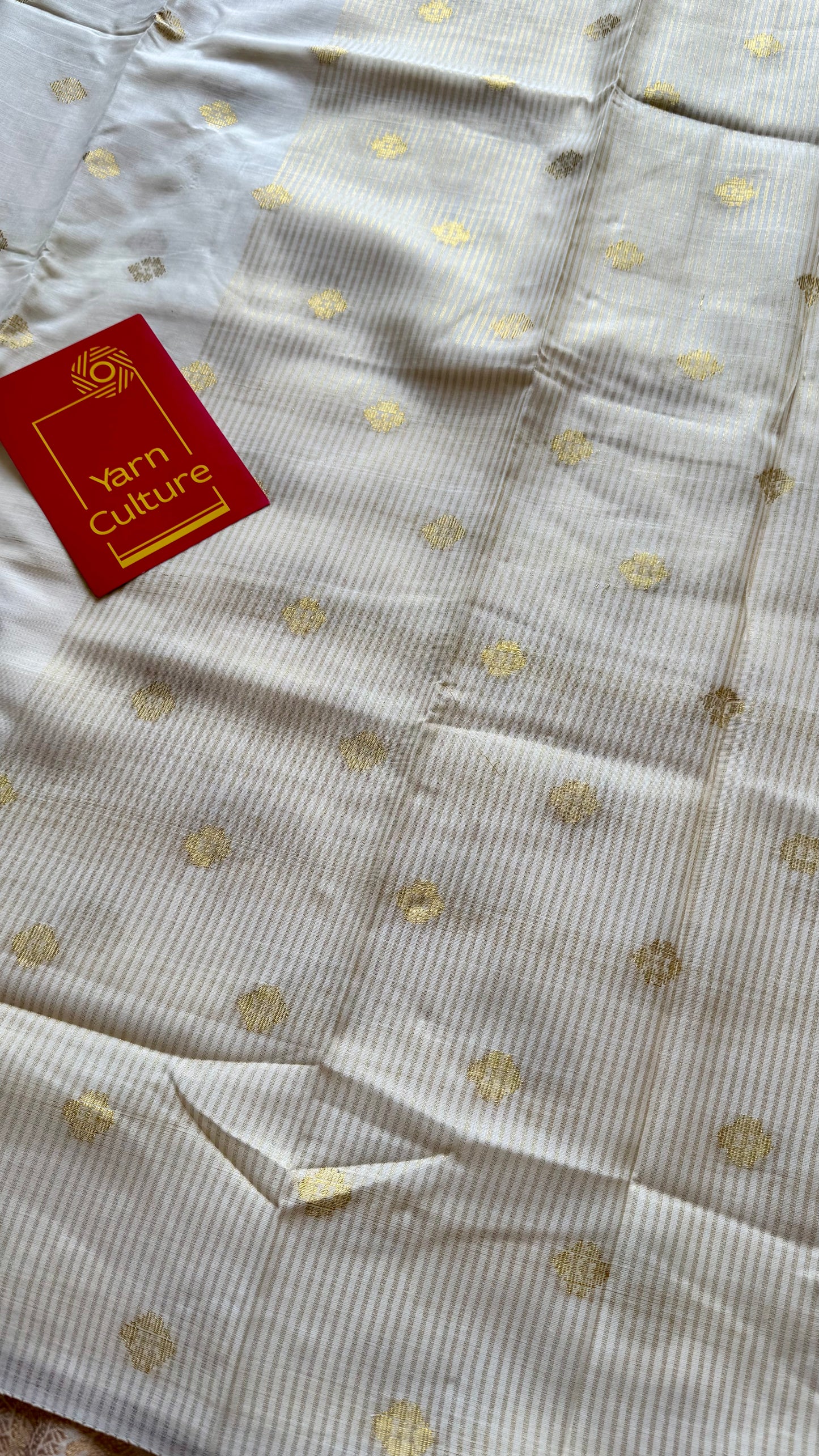 Ivory and gold kerala saree with woven buttas, striped pallu - YCIEON43