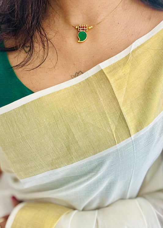 Single mango palakka pendant in invisible chain - YCAGC102