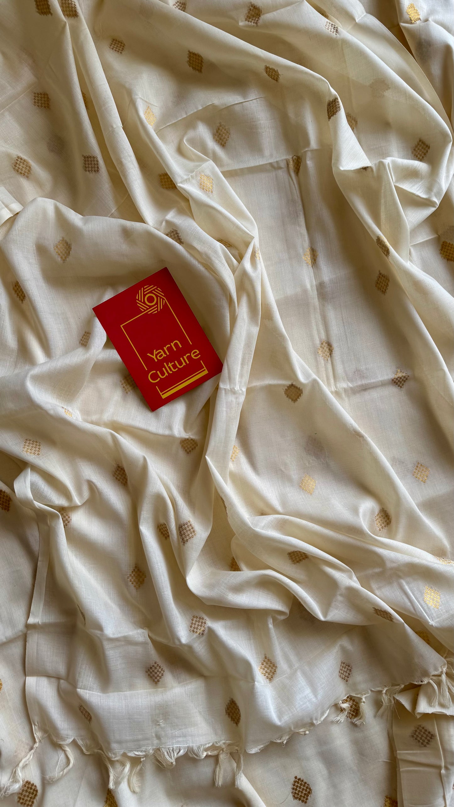 Ivory and gold kerala saree with woven buttas - YCIEON42