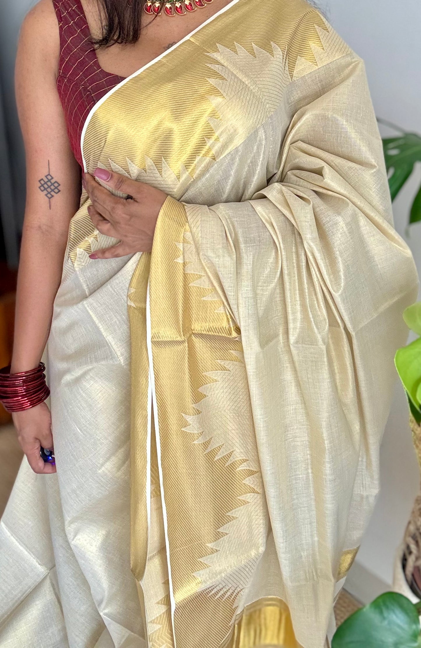 Ivory and gold soft tissue cotton saree, temple motif border - YCIEON81