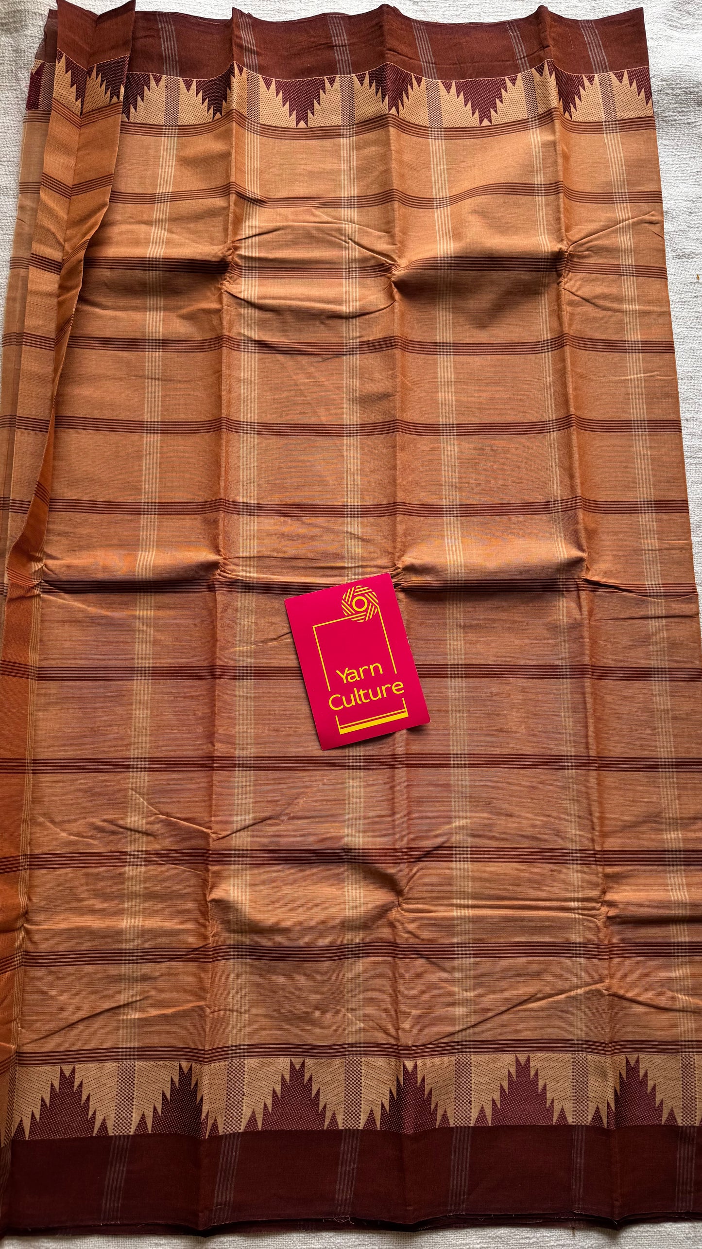 Chettinad cotton saree with light brown and dark brown checks, temple motif border - YCCOTNAP71