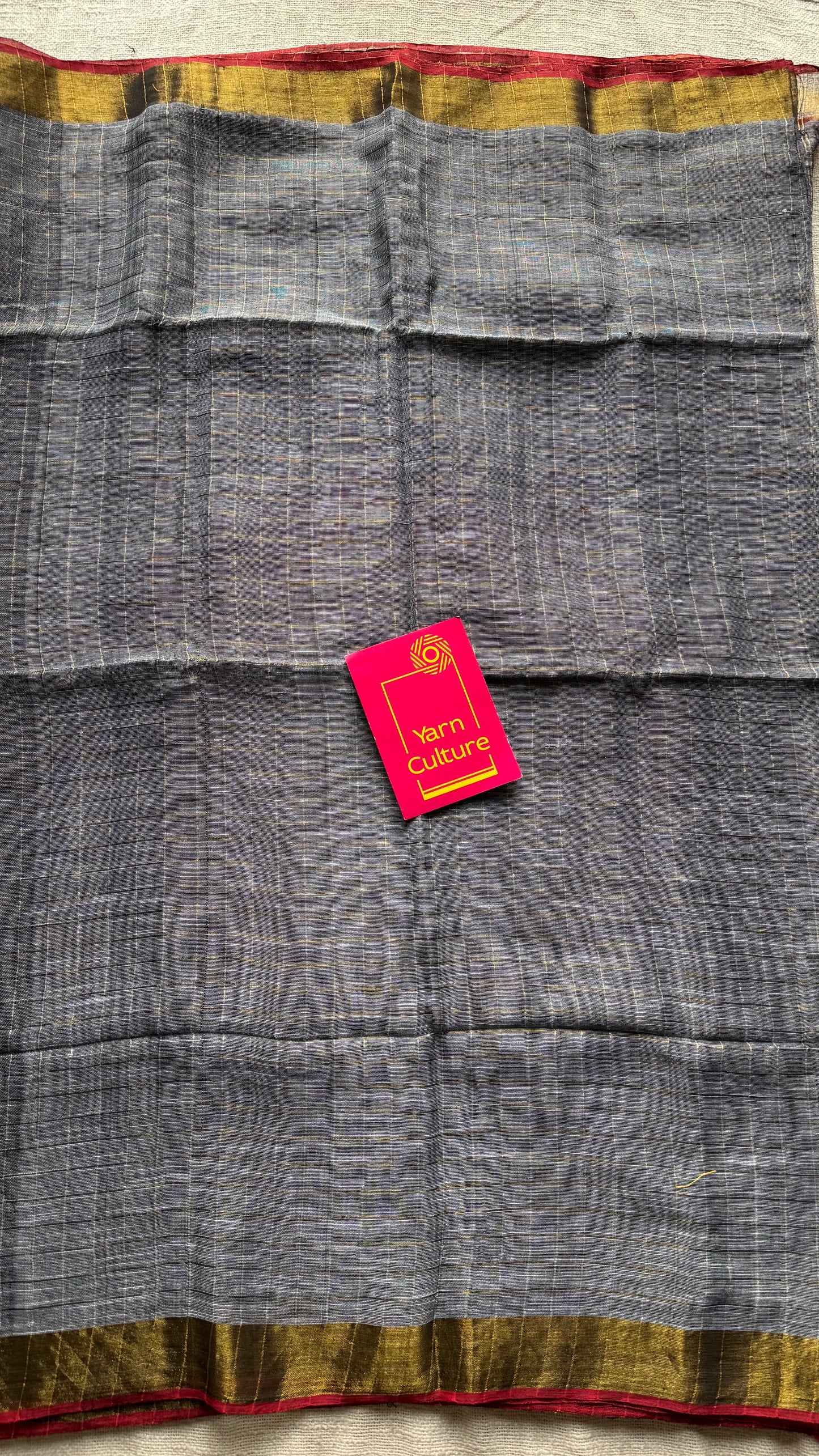 Grey linen by cotton saree, gold checks & gold zari pallu - YCBCLCFE388